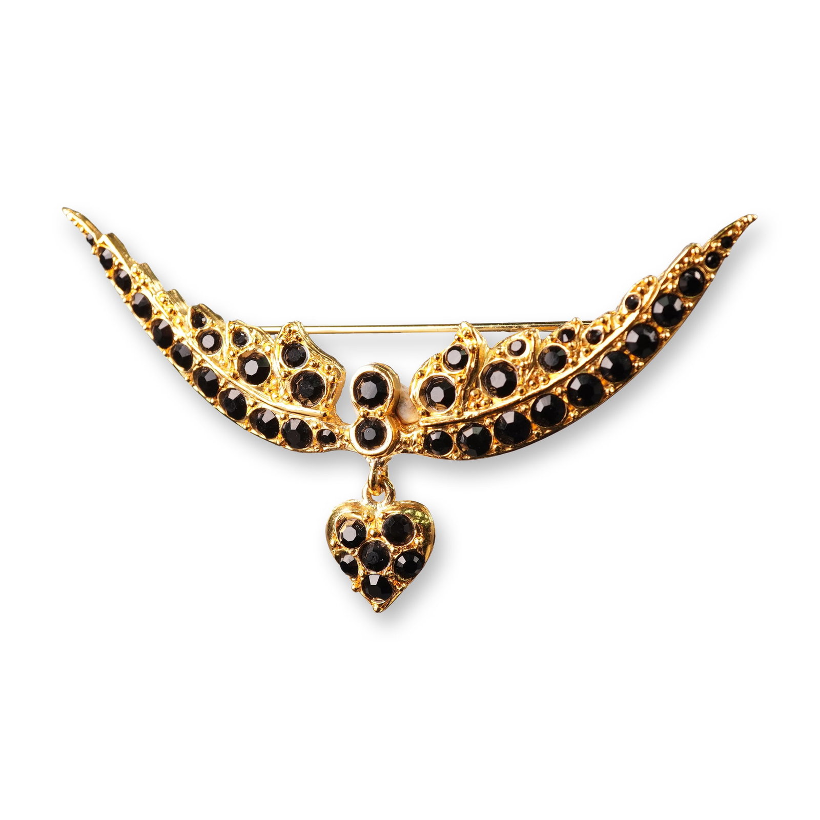 Sonia Rykiel Paris Gold-Tone and Black Rhinestone Winged Brooch with Heart Dangle: A Sonia Rykiel gold tone and black rhinestone winged brooch with heart dangle. The brooch features a sweeping, wings-shaped design crafted from yellow-toned metal, richly embellished with numerous sma