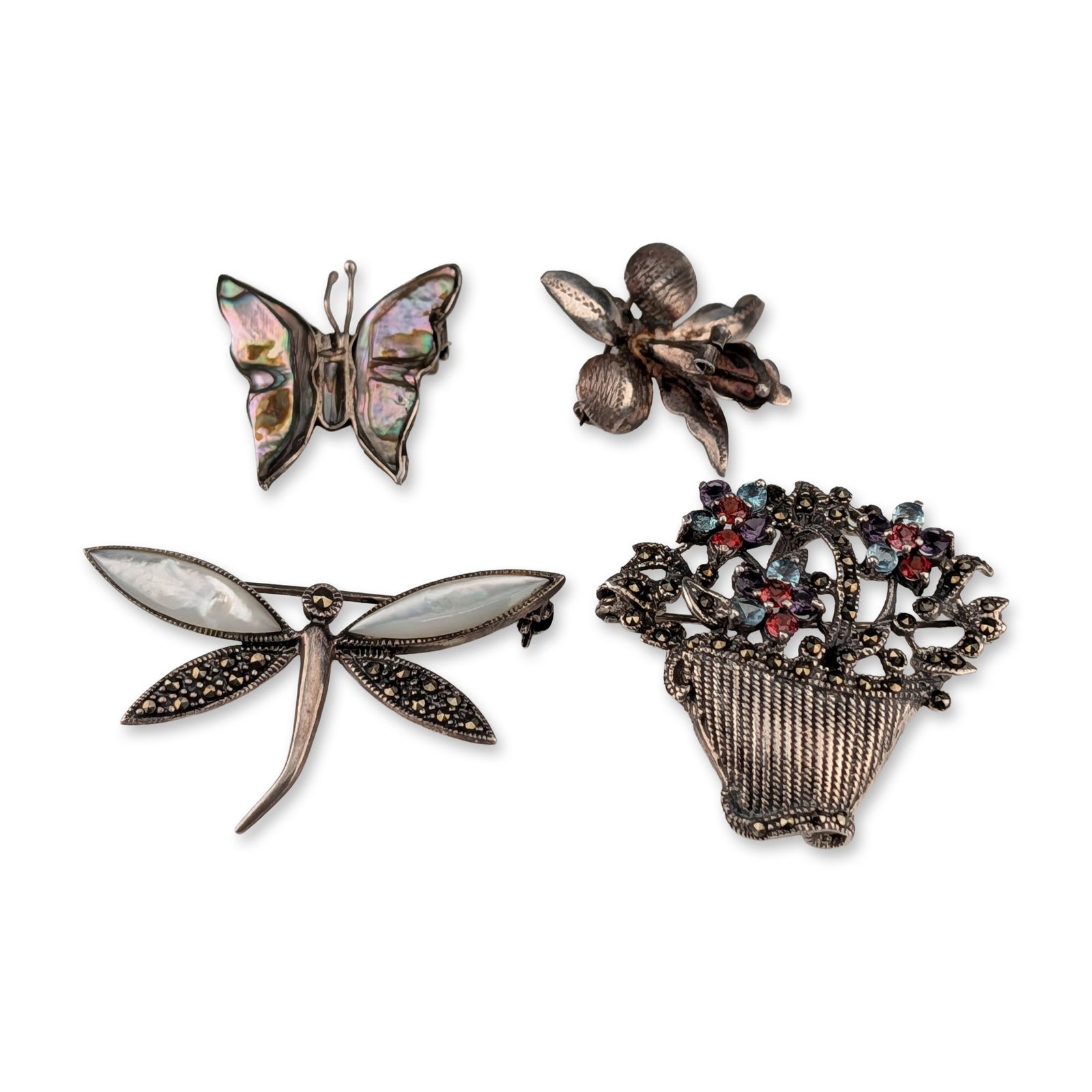 4pc Collection of Sterling Silver and Marcasite Nature Brooches: Collection of four vintage nature-themed brooches in sterling silver. A Mexican butterfly brooch by Modern Art Mexico features segmented abalone shell inlays, with the reverse impressed HECHO EN MEXIC