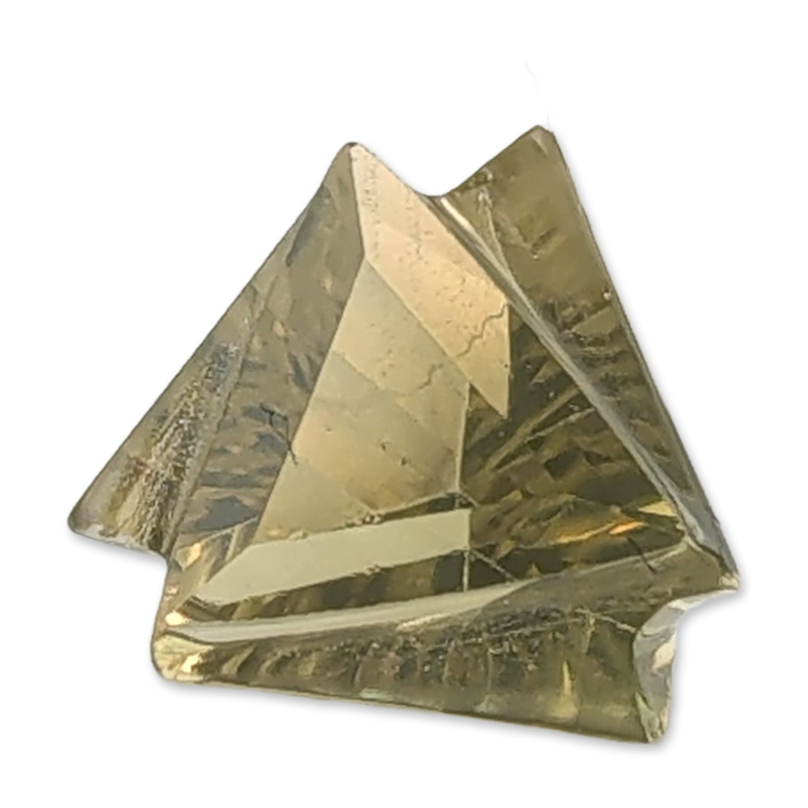 Fantasy Cut Loose Citrine Gemstone: Loose citrine gemstone in a pale chartreuse hue featuring a geometric fantasy cut with a triangular base and architectural faceting. The transparent specimen displays high clarity and a well-polished