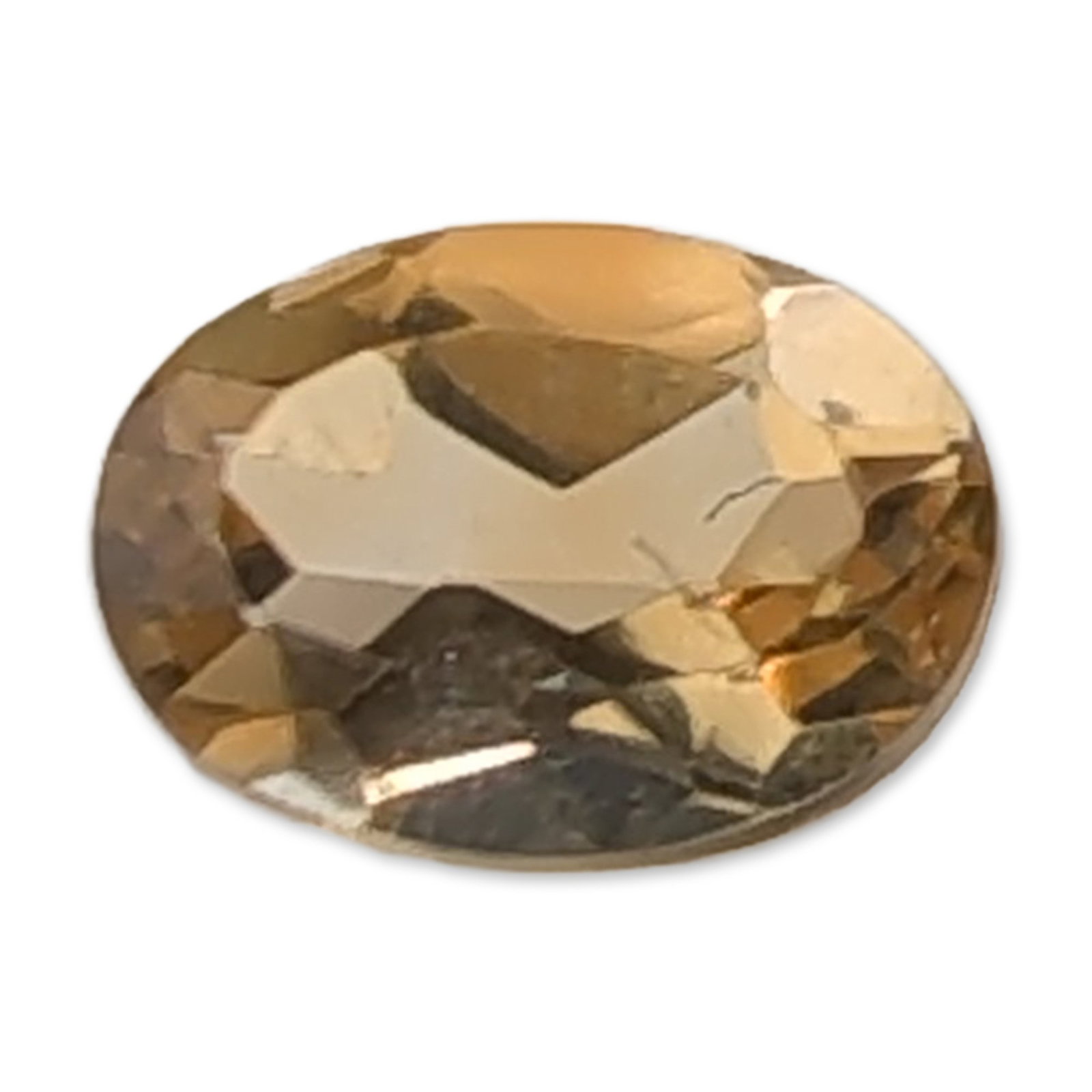 Oval Faceted Yellow Citrine Gemstone: A loose faceted citrine gemstone of a light yellow to champagne hue. The stone features an oval faceted cut, it is transparent and eye-clean with well-defined facet junctions.5 x 7 mm0.7 ct. Dimension