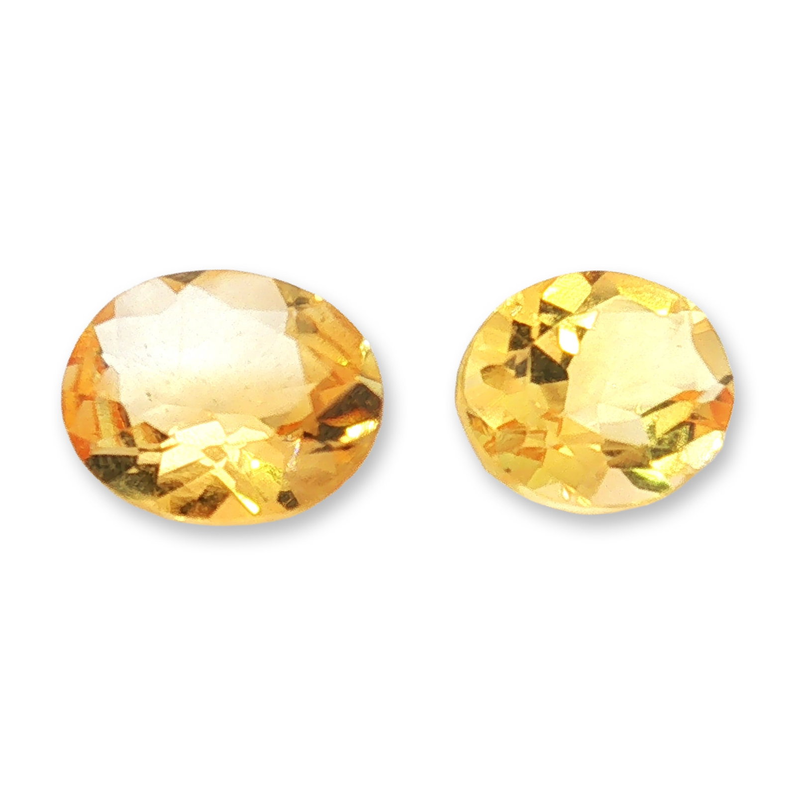 2pc Oval Citrine Gemstones: Set of 2 Citrine stones weighting 2.35-2.66cts. Citrine is a sunny, golden variety of quartz prized for manifesting abundance, boosting self-confidence, and clearing negative energy. Often called the 