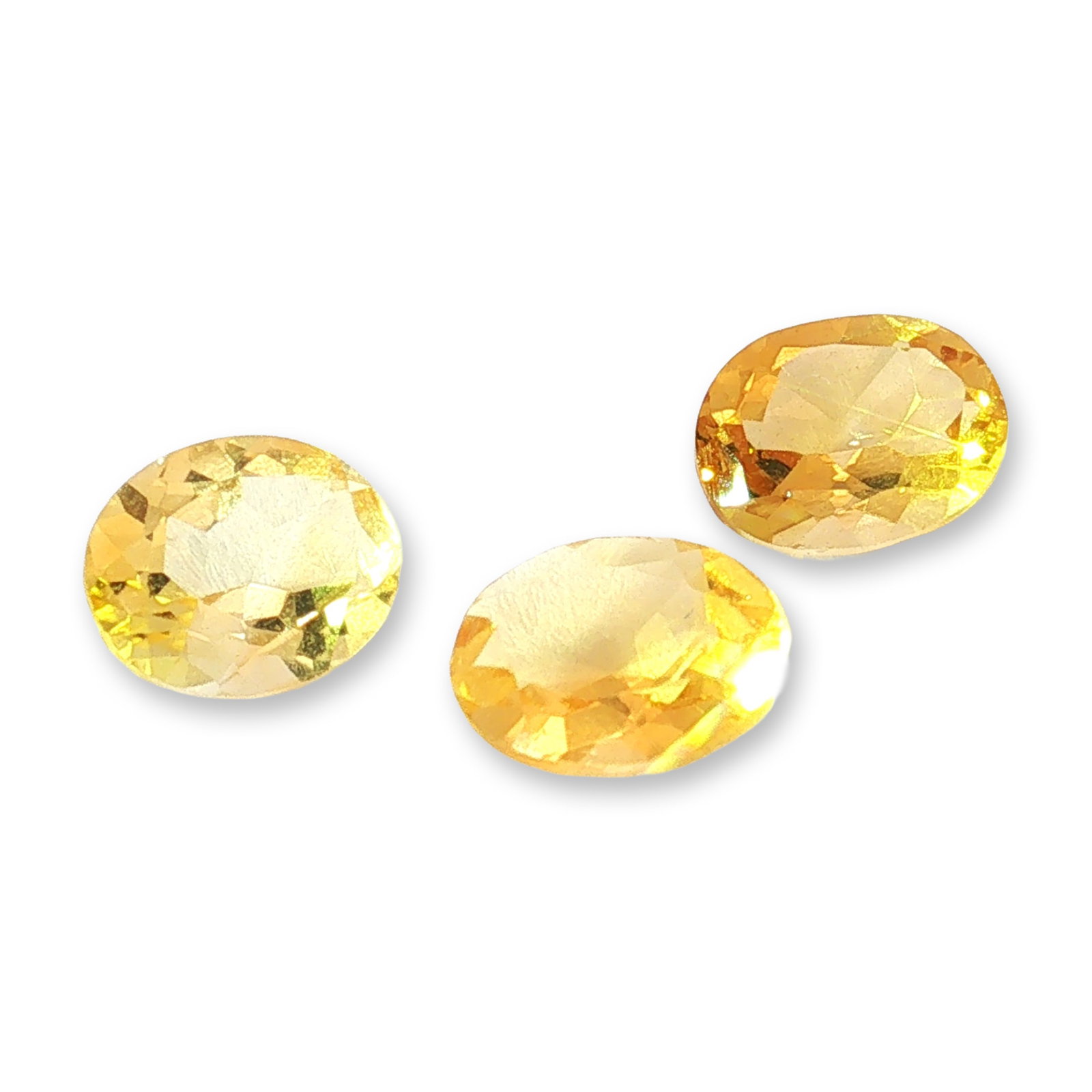 3pc Oval Citrine Gemstones: Set of 3 Citrine stones weighting 1.41-1.70cts. Citrine is a sunny, golden variety of quartz prized for manifesting abundance, boosting self-confidence, and clearing negative energy. Often called the
