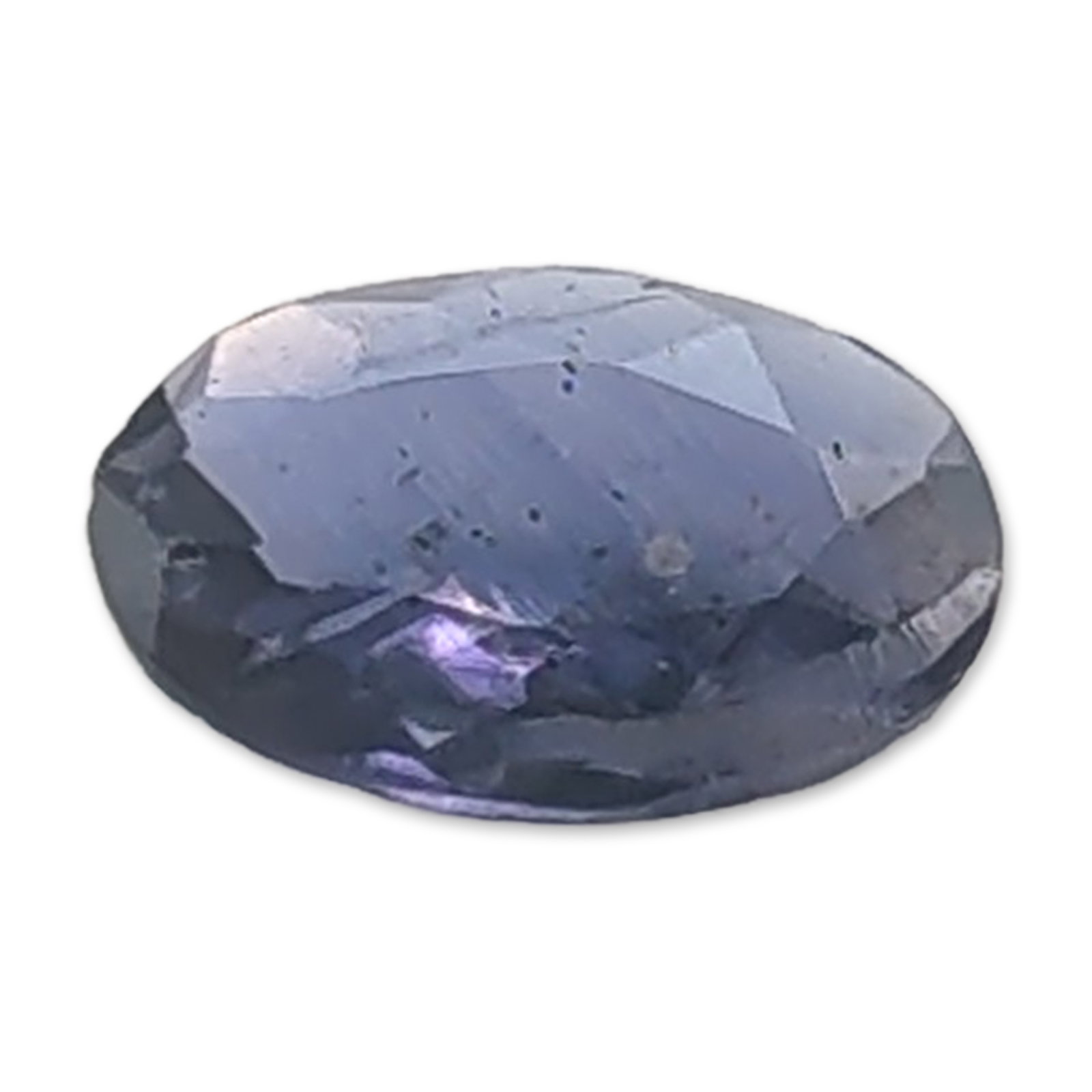 Oval Mixed-Cut Violet-Blue Iolite Loose Gemstone: One loose faceted iolite gemstone. The stone is presented in an oval mixed-cut with a notably shallow profile and translucent violet-blue color. Visible internal characteristics include dark specks