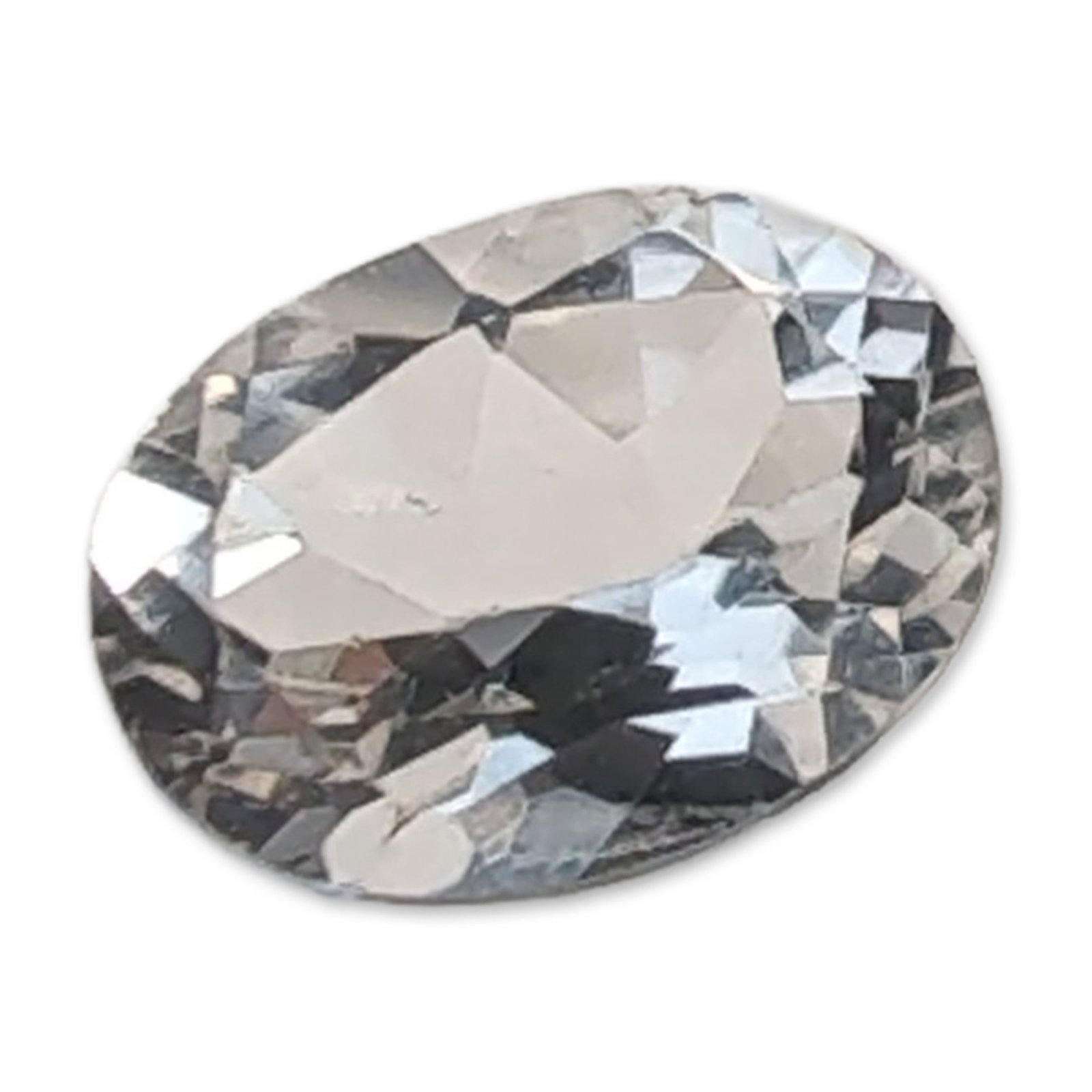 Oval Cut White Sapphire Loose Gemstone: Oval faceted loose white sapphire gemstone. The stone exhibits a colorless, transparent appearance with a brilliant-style cut. Approximately 1.4 caratsApproximately 7.9 mm in length. Dimensions: 7.9mm