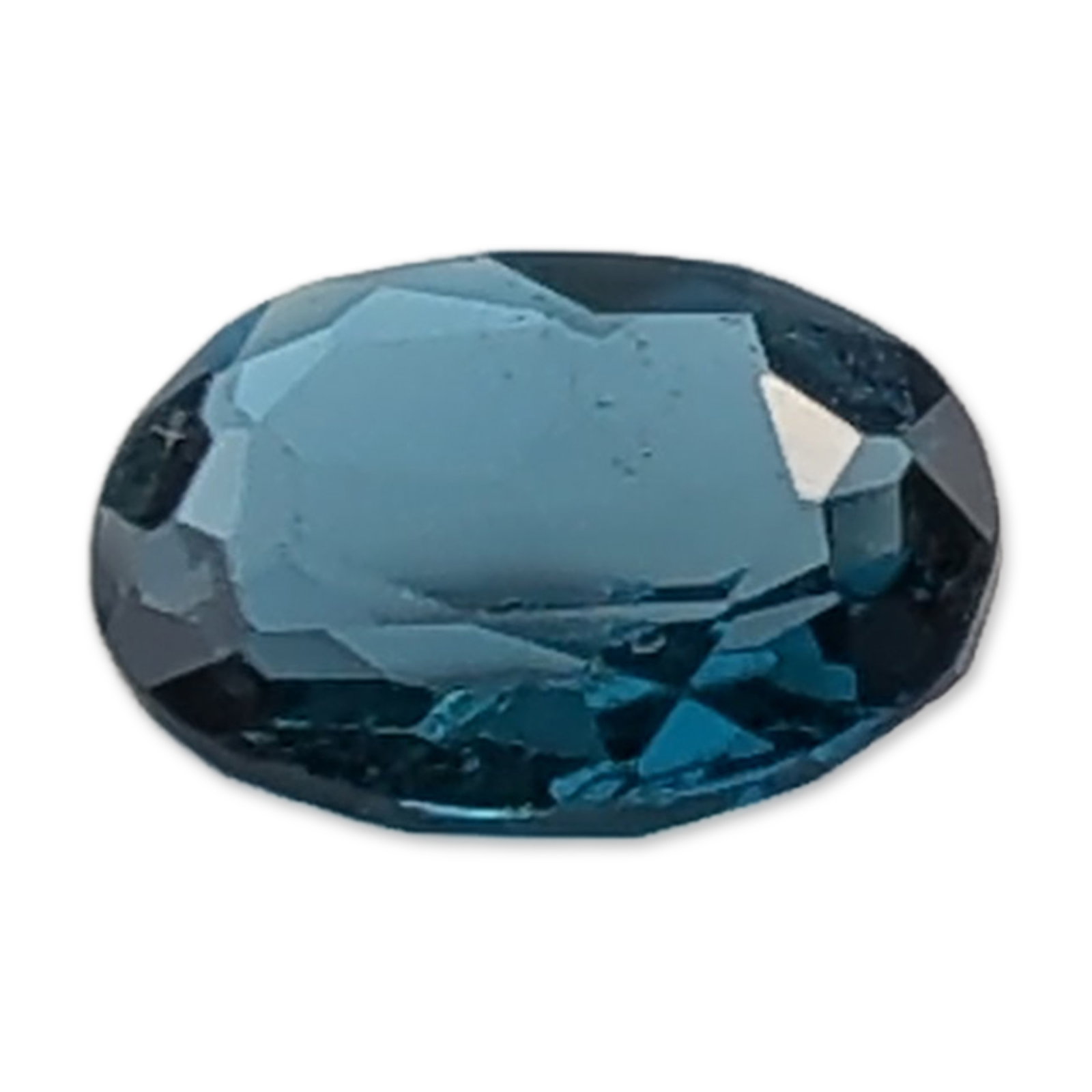 Oval Cut London Blue Color Topaz Gemstone: A faceted topaz gemstone, featuring an oval cut with a stepped pavilion. The stone is transparent with a saturated teal-blue hue and exhibits visible internal characteristics.Weight: 1.4