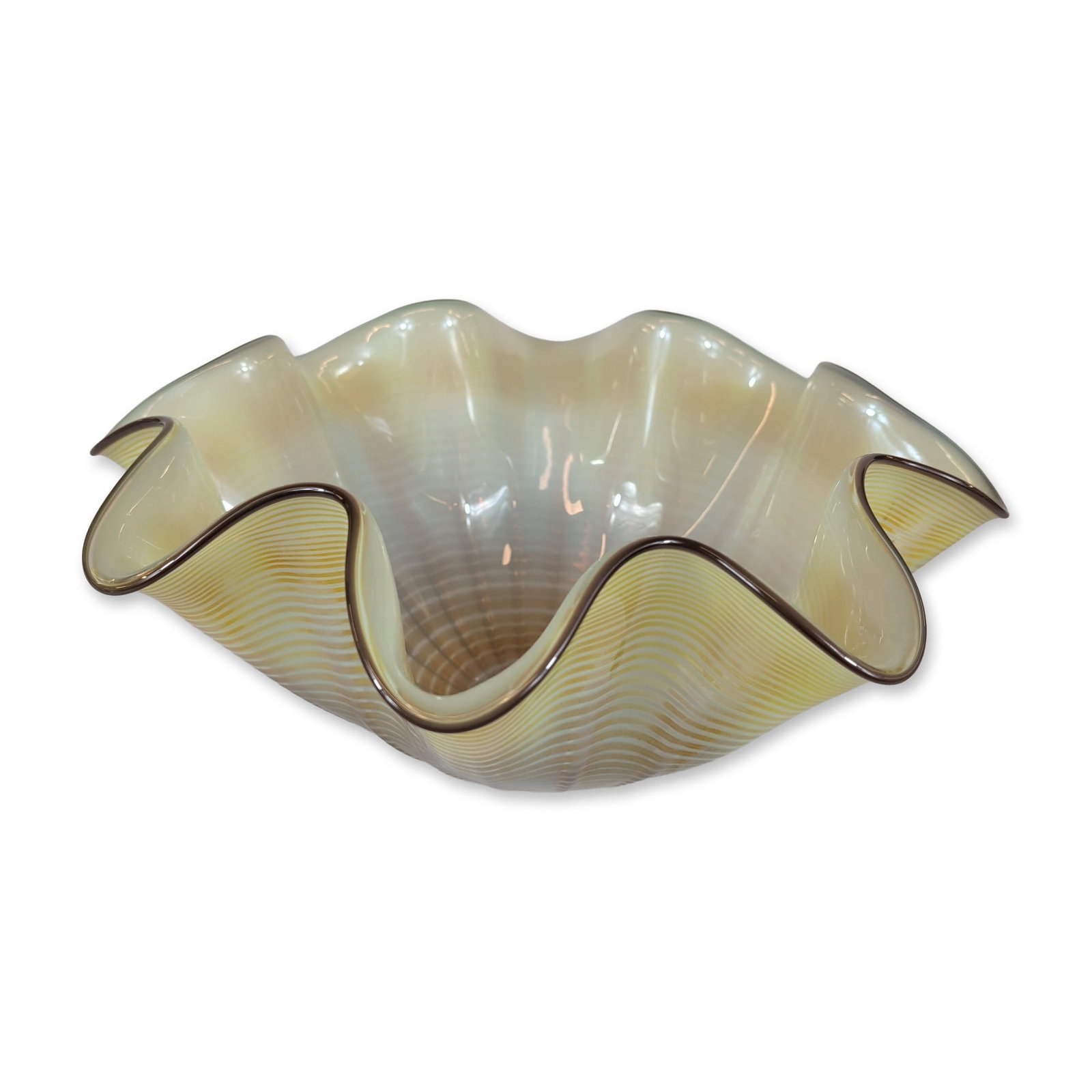 Art Studio Glass Citron Seaform Glass Sculpture: Sculpture in hand-blown glass, featuring a ruffled citron-colored body decorated with fine white concentric threadwork. The vessel is finished with a dark glass lip wrap. The base features a polished 