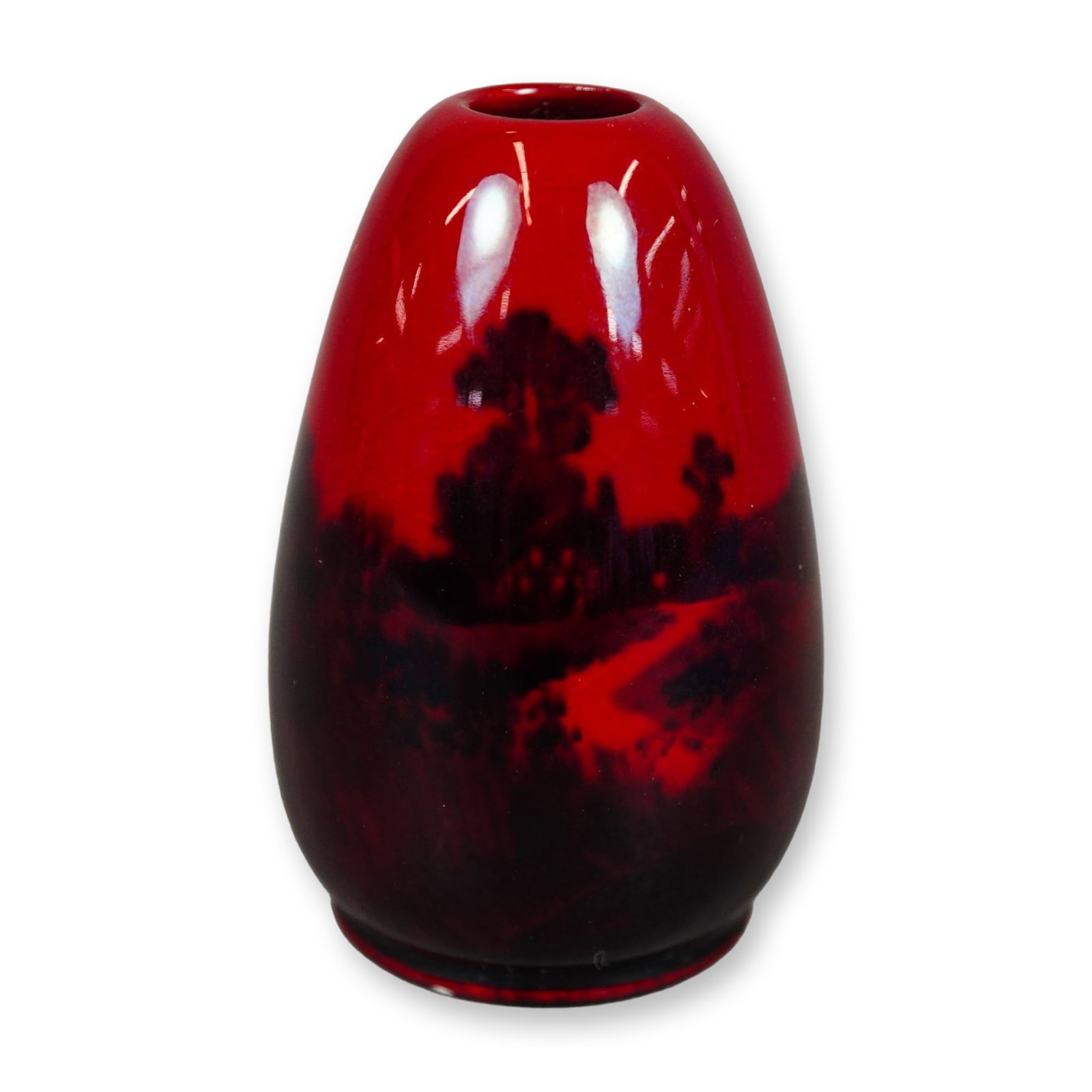 Royal Doulton Flambe Miniature Vase, Cottage Scene: A small vase finished in a red-fired flambe glaze, decorated with a black countryside landscape depicting a cottage. Features a Royal Doulton Flambe backstamp. Dimensions: 1.75"W x 2.5"H Manufacturer 