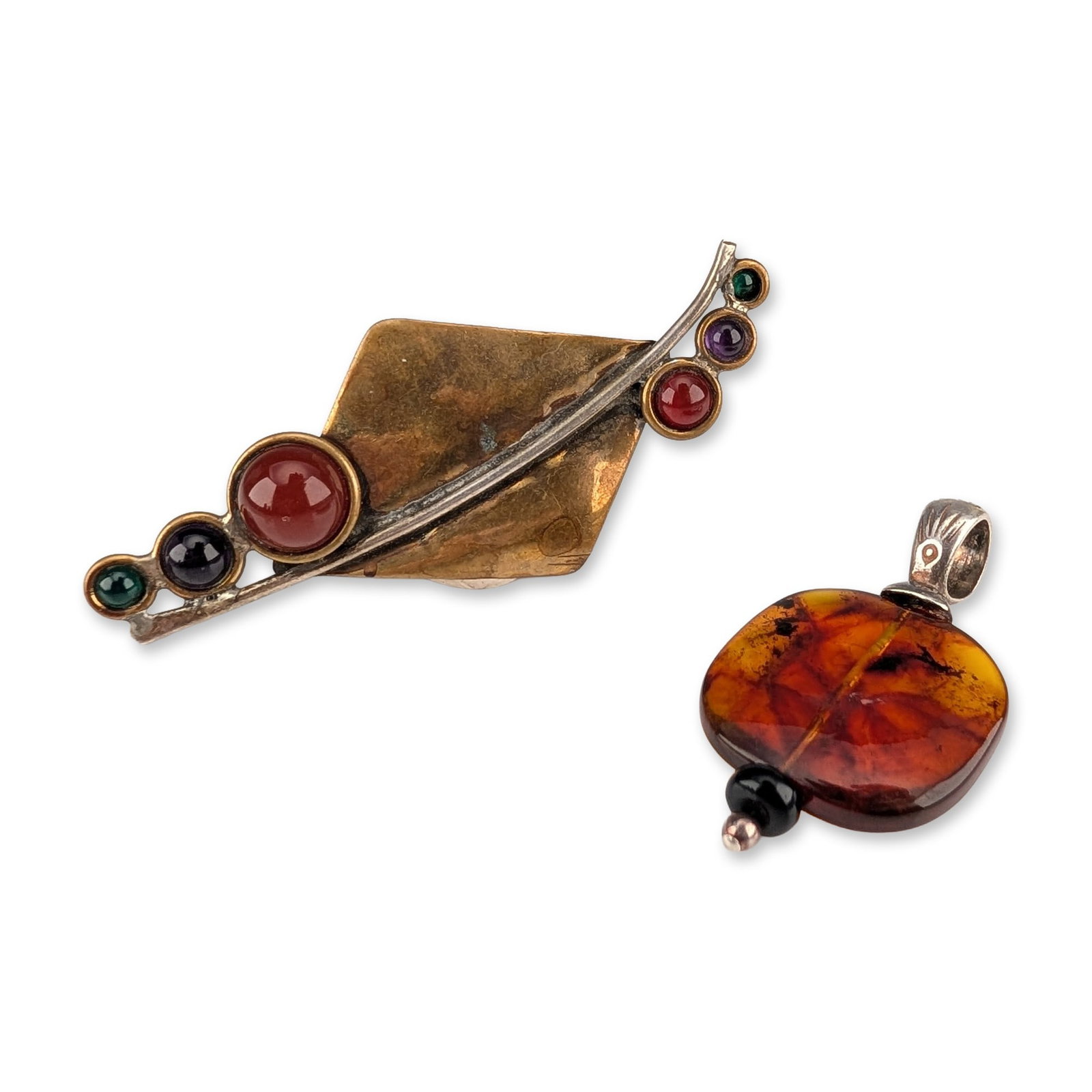 2pc Louis Booth Modernist Mixed-Metal Brooch and Sterling Silver Amber Pendant: Louis Booth modernist mixed-metal brooch in sterling silver and brass, featuring a central diamond-shaped brass plate set with a sterling silver crossbar mounted with six round cabochon stones in gree