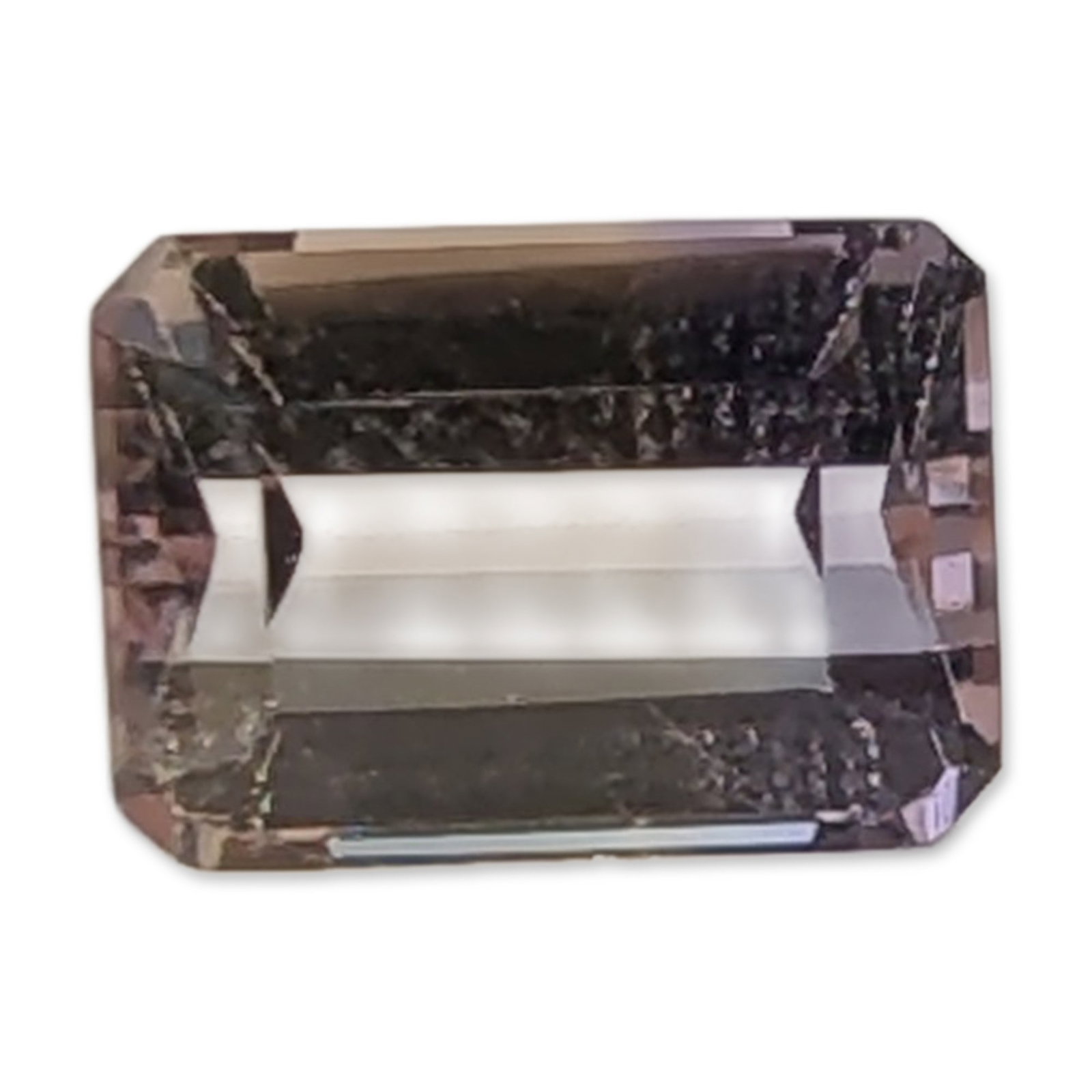 Loose Bicolor Emerald Cut Ametrine Gemstone: A loose ametrine gemstone in a rectangular emerald cut. The stone features distinct color zoning transitioning from a pale straw yellow to a light lavender purple with characteristic step facets and