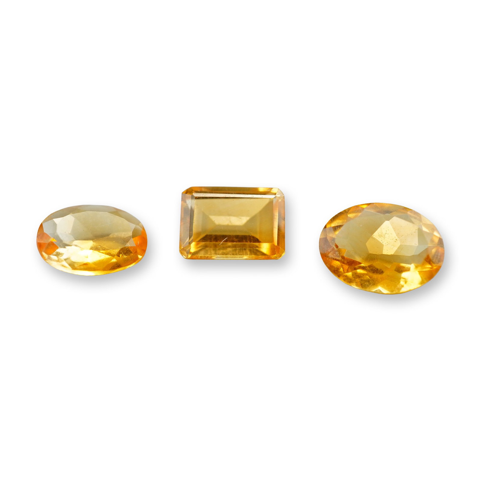3pc Oval and Rectangular Citrine Gemstones: Set of 3 Citrine stones. Citrine is a sunny, golden variety of quartz prized for manifesting abundance, boosting self-confidence, and clearing negative energy. Often called the "Merchant's Stone," it 