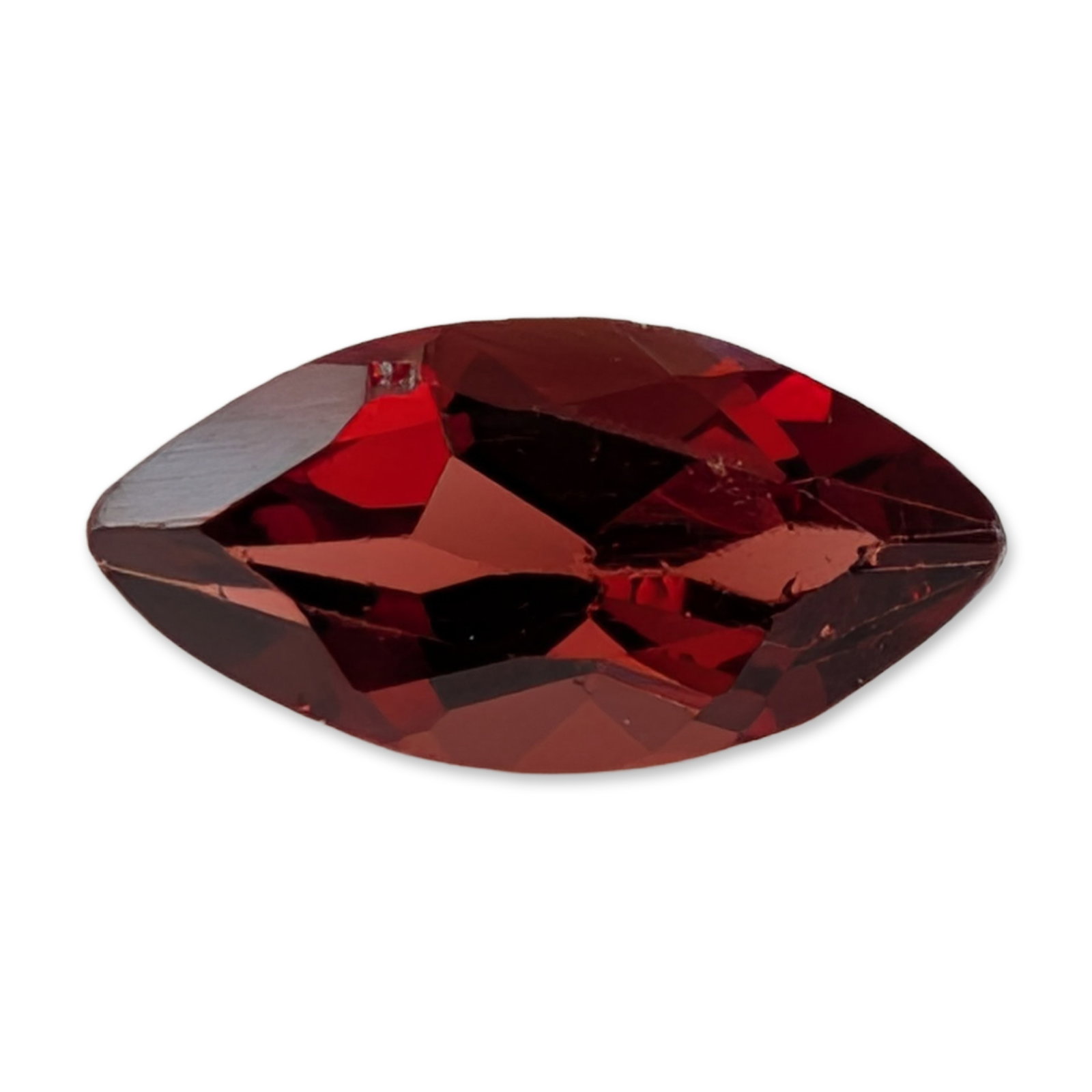 Marquise-Cut Red Garnet Loose Gemstone: Appears to be a natural red garnet. Marquise-cut loose gemstone featuring a deep, saturated red color tone. The stone is faceted with a standard crown and pavilion. One piece total.8.7 x 4.1 mm0.8 car