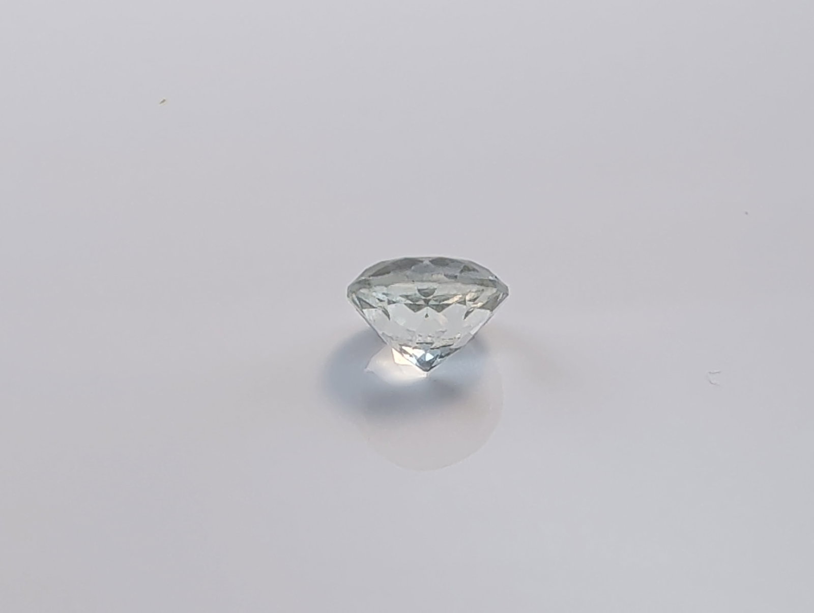 Faceted Round Colorless Gemstone - 2