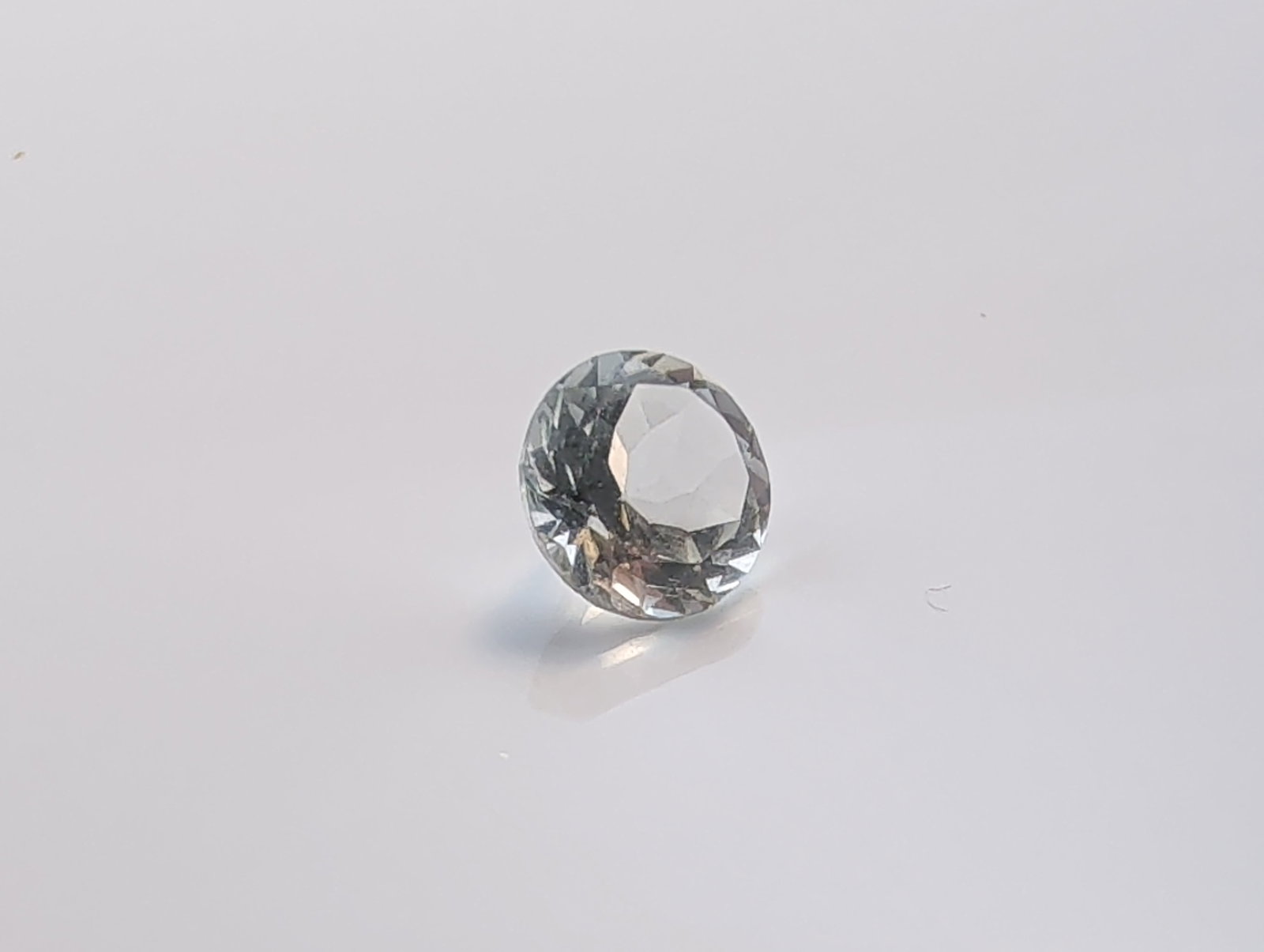 Faceted Round Colorless Gemstone - 3
