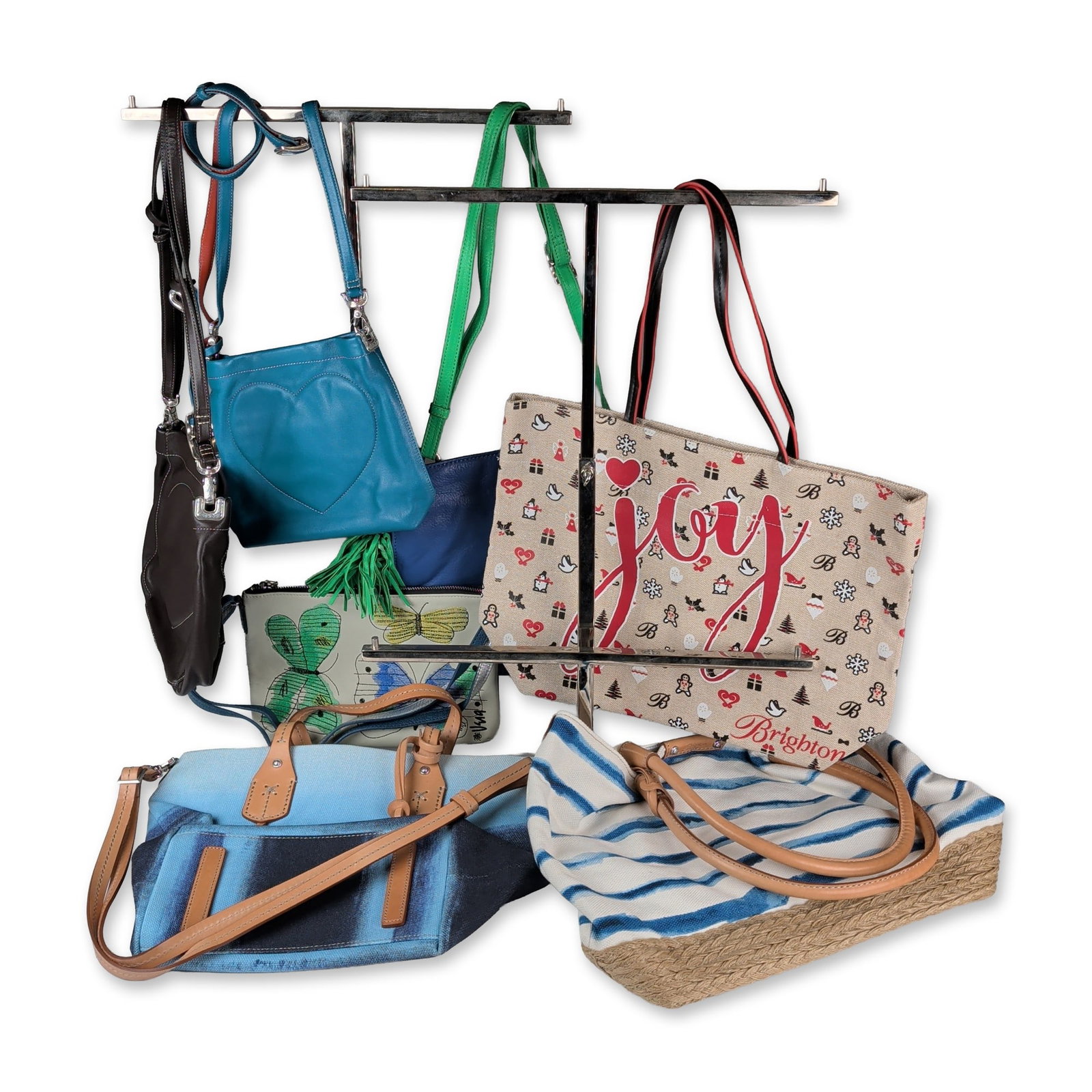 7pc Brighton Leather Handbags and Canvas Totes: Group of Seven handbags and totes in leather, canvas, and jute, featuring various seasonal motifs and styles. The collection includes a cream leather shoulder bag with embroidered yellow, blue, and gr