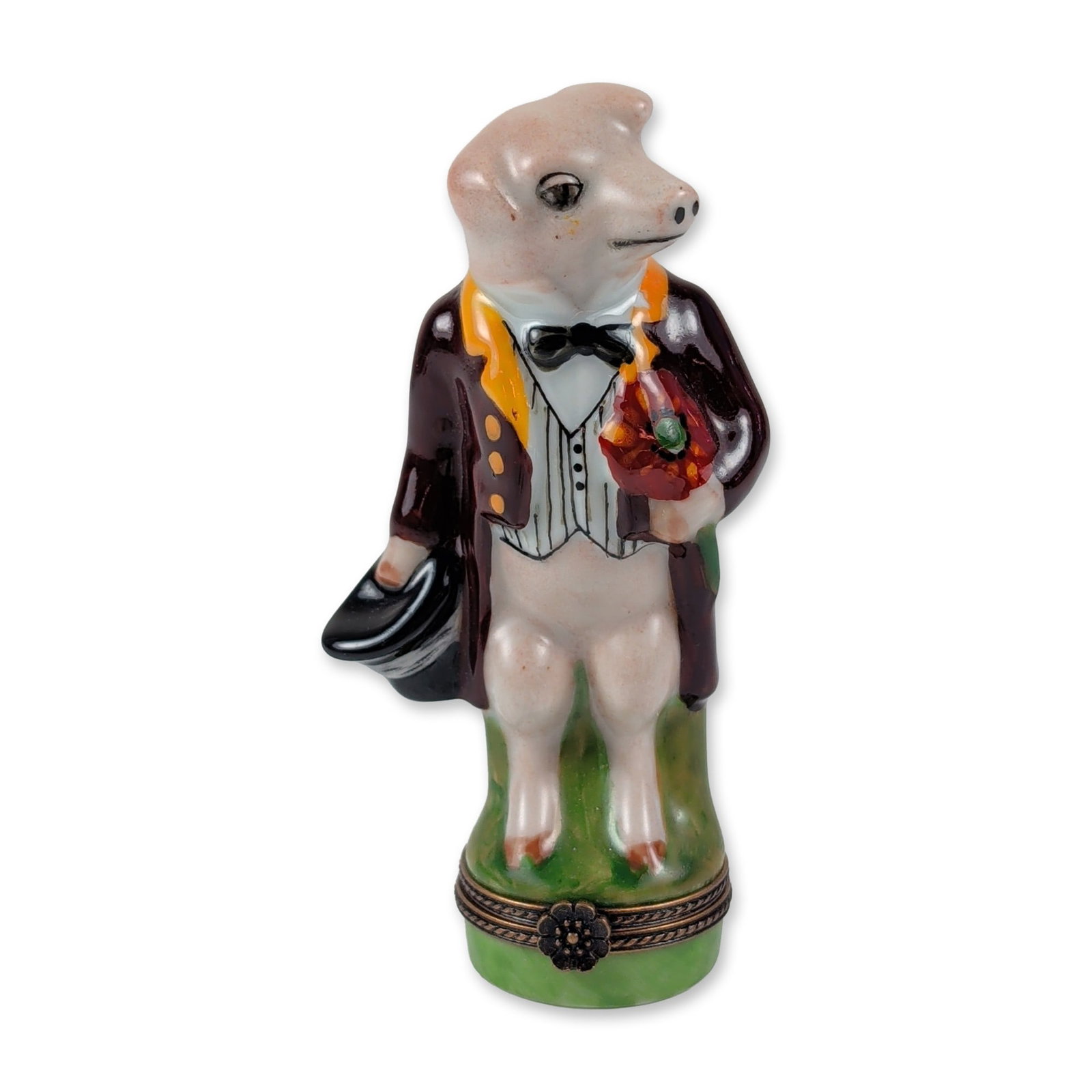 Limoges Hand-Painted Porcelain Gentleman Pig Trinket Box: French hand-painted porcelain hinged trinket box modeled as an anthropomorphic pig in formal attire. The character is depicted wearing a burgundy tailcoat, a yellow cravat, a black bow tie, and a pins