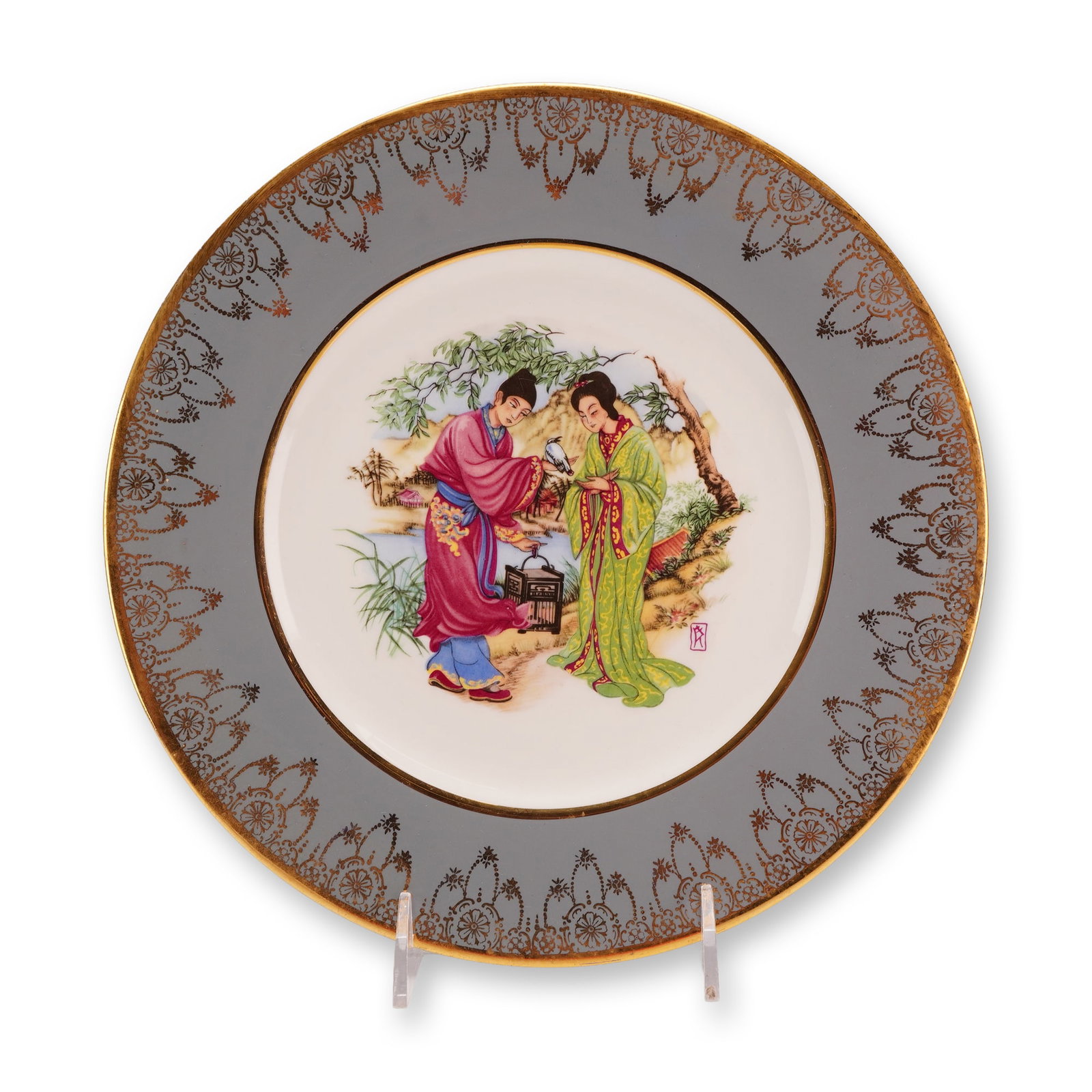 Wedgwood Bone China Chinoiserie Decorated Plate: This bone china plate, manufactured by Wedgwood, features a central polychrome enamel scene in the Chinoiserie style. The decoration depicts two figures in traditional Chinese attire within a landscap