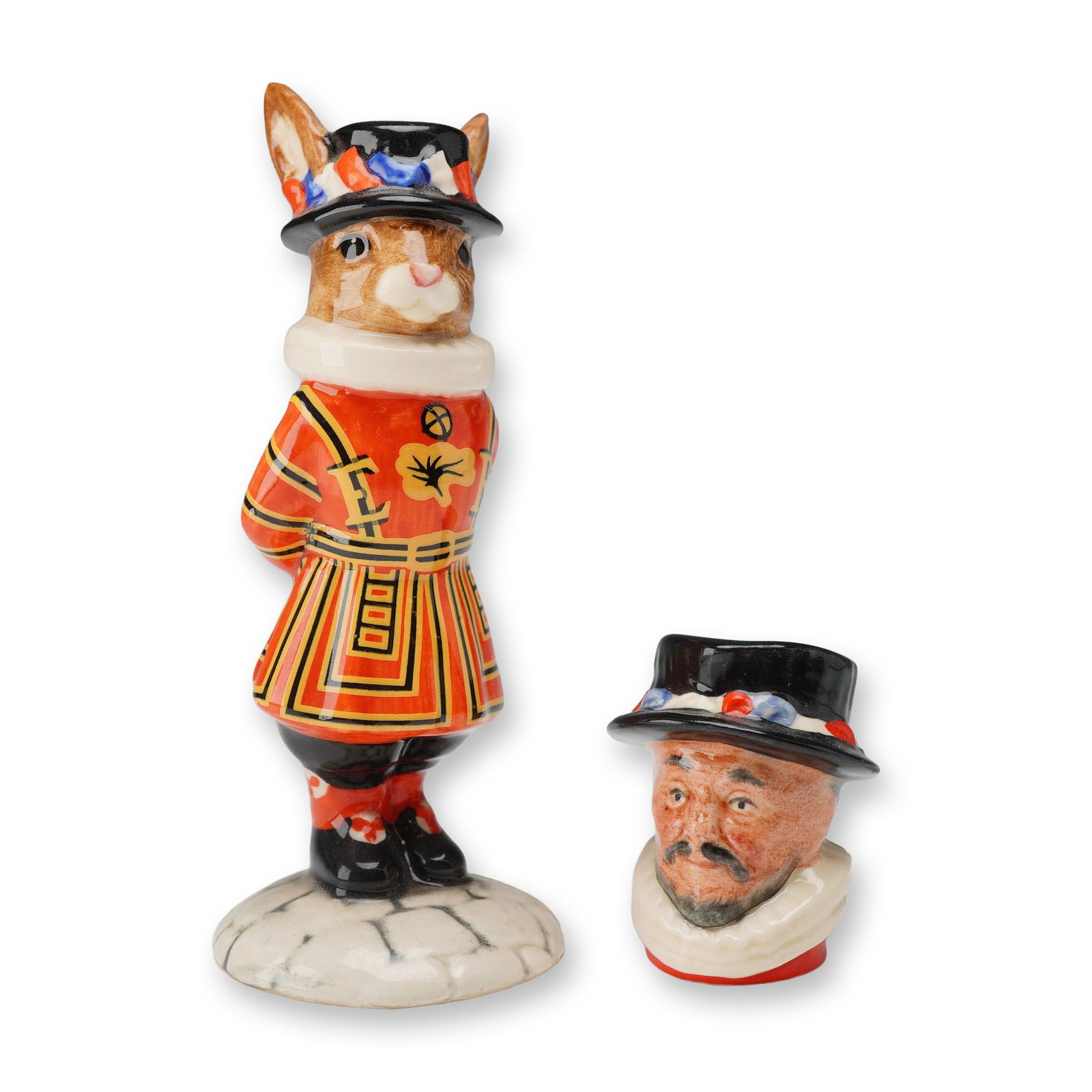 2pc Royal Doulton Beefeater Porcelain Figurine and Tiny Character Jug: Featuring the Yeoman Warder Beefeater theme, including one Bunnykins figurine and one miniature character jug. The first item is a Royal Doulton Beefeater Bunnykins figurine, model DB 163, depicting a