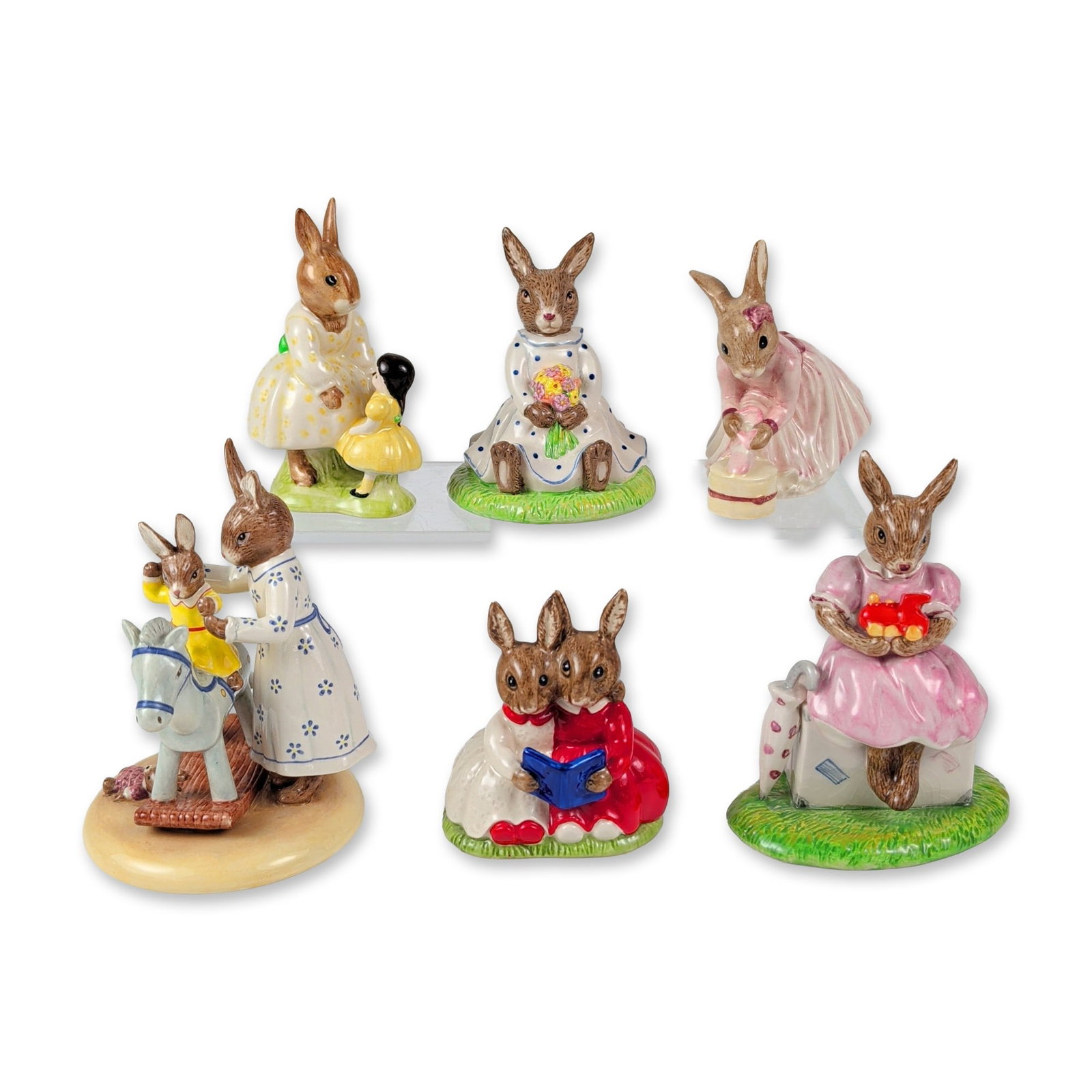 6pc Royal Doulton Bunnykins Ceramic Figurines: This six-piece collection of glazed English ceramic figurines from the Royal Doulton Bunnykins line features anthropomorphic rabbit characters in specialized commemorative and character roles. The gro