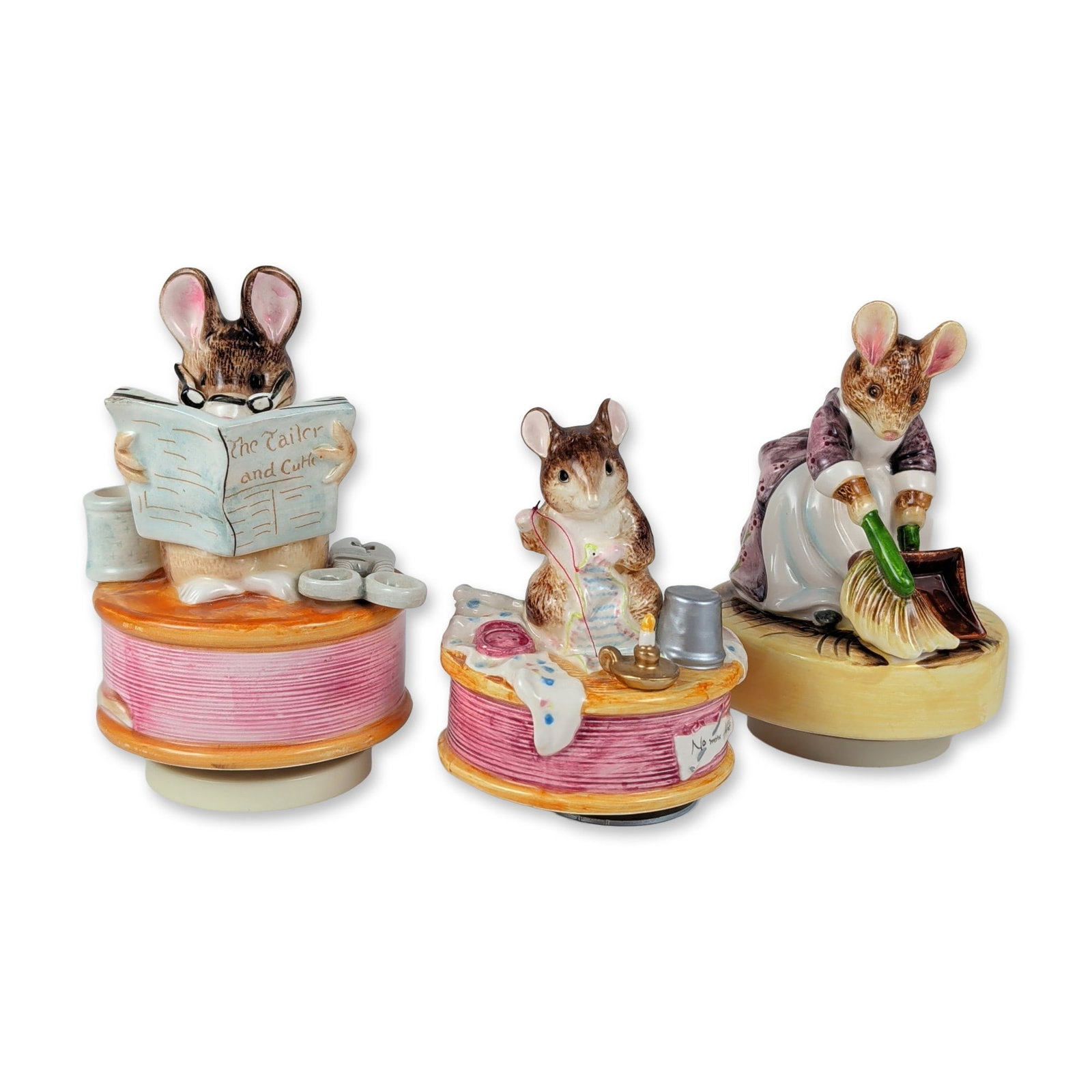 3pc Beatrix Potter Musical Figurines: This three-piece grouping of hand-painted glazed ceramic musical figurines features classic characters from the Beatrix Potter series. The collection includes a Hunca Munca figural music box depicted 