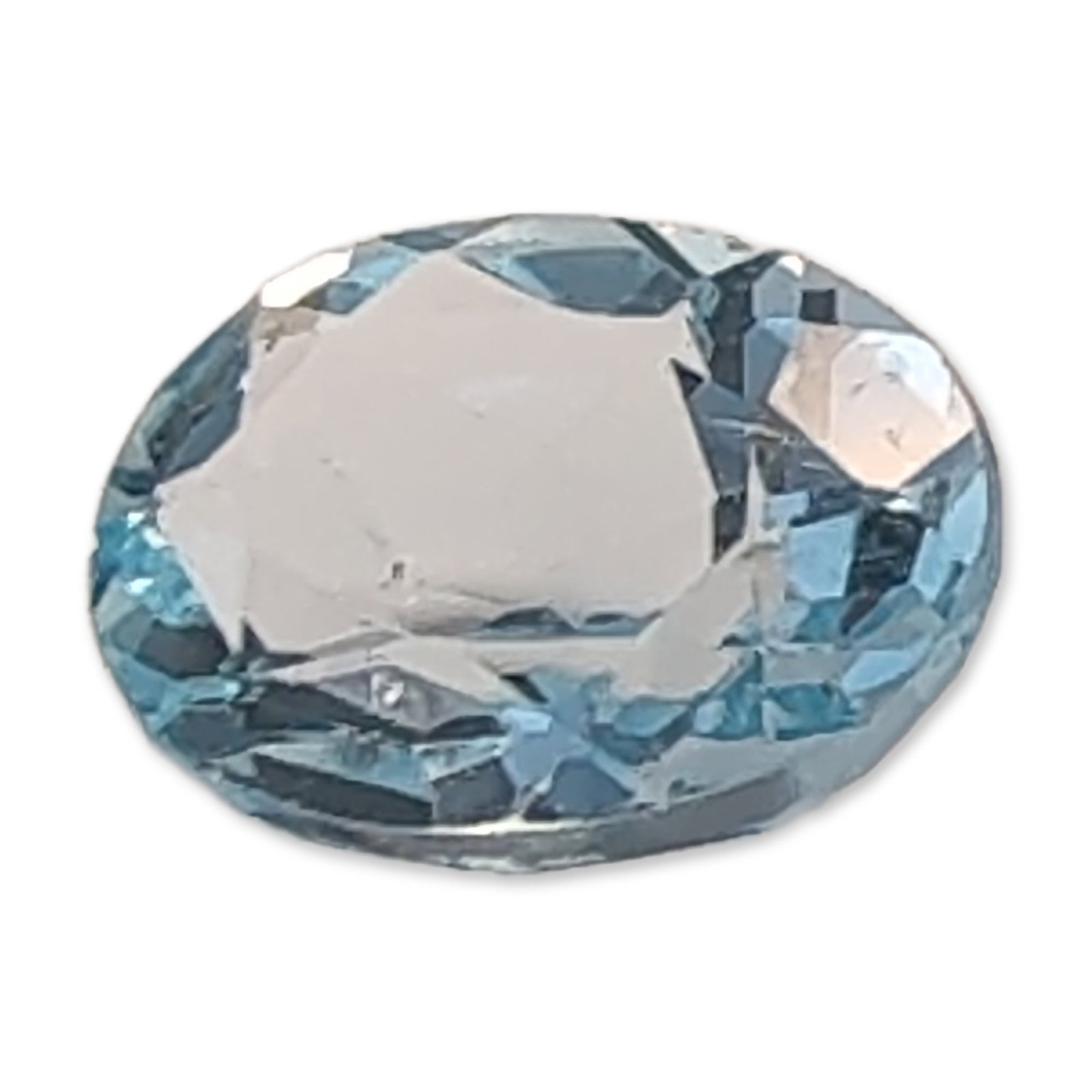 Oval Cut Sky Blue Loose Topaz Gemstone: Oval brilliant cut. Loose faceted Topaz gemstone in sky blue. Features eye-clean clarity and high transparency. Accompanied by handwritten specification tag.Length: 9.0 mmWeight: 2.2 carats. Dimension