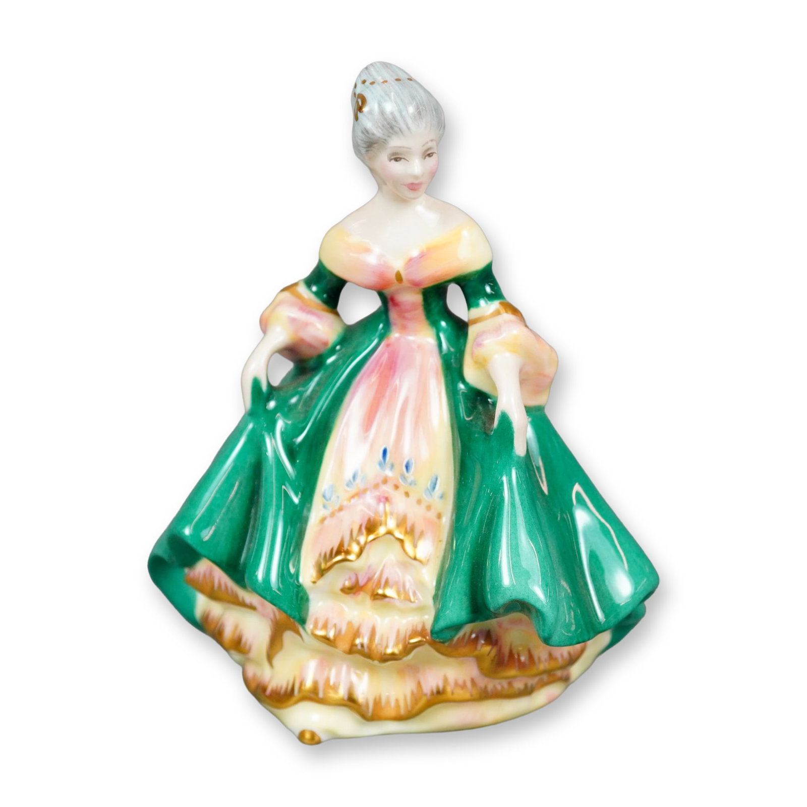 Royal Doulton Bone China Signature Edition Figurine, Southern Belle HN3244: Hand painted figure of a lady in a green gown with yellow and pink hues, accented with gilt designs. Royal Doulton backstamp. Artist: Peggy Davies Dimensions: 5.50"L? x 4.75"W? x 6.00"H Manufacturer o