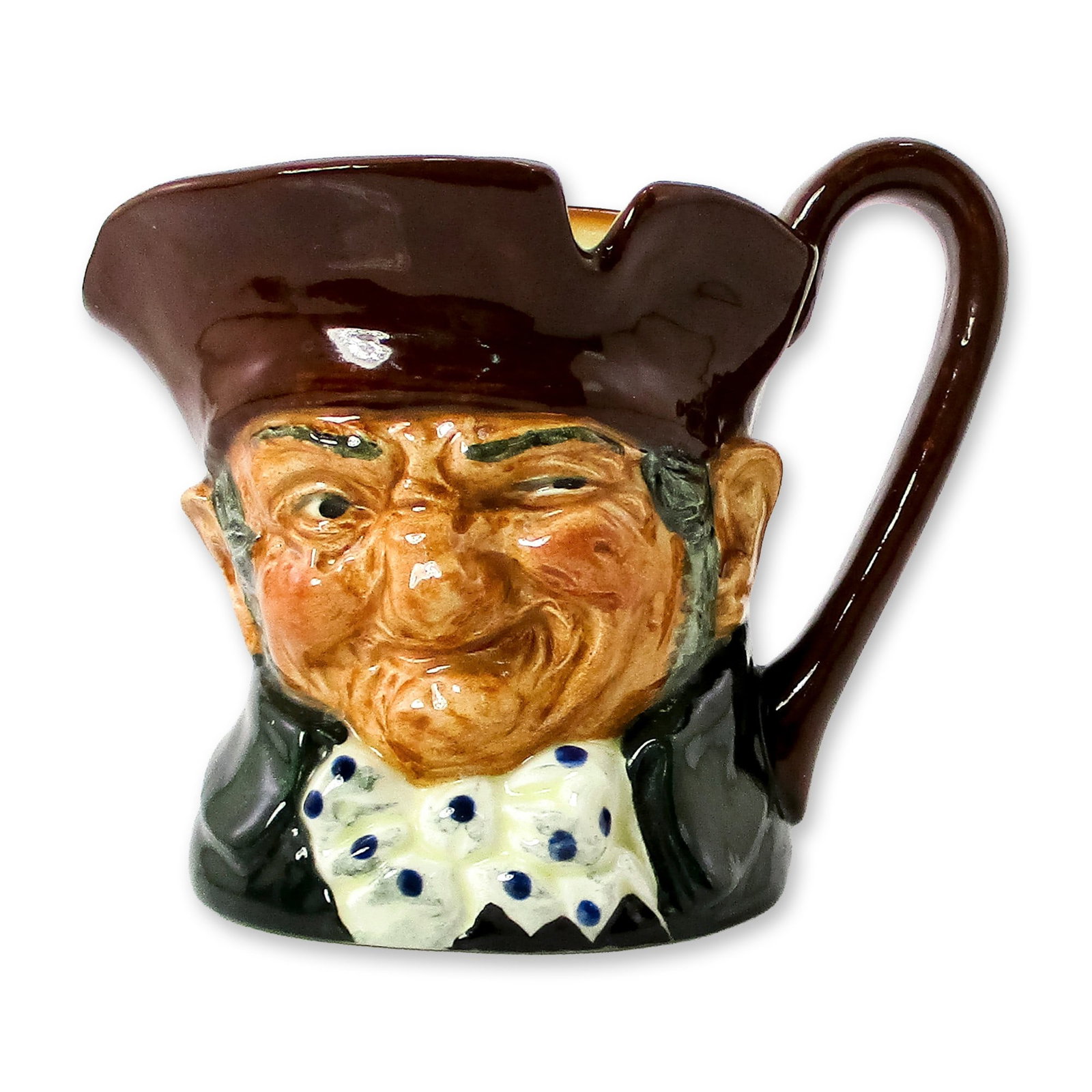 Old Charley D5527 - Small - Royal Doulton Character Jug: Brown hat; dark green coat; blue polka- dot bow tie. "Ten o'clock and all's well" was the familiar call of the Charlies, watchmen who originated during the reign of Charles II and were named after him