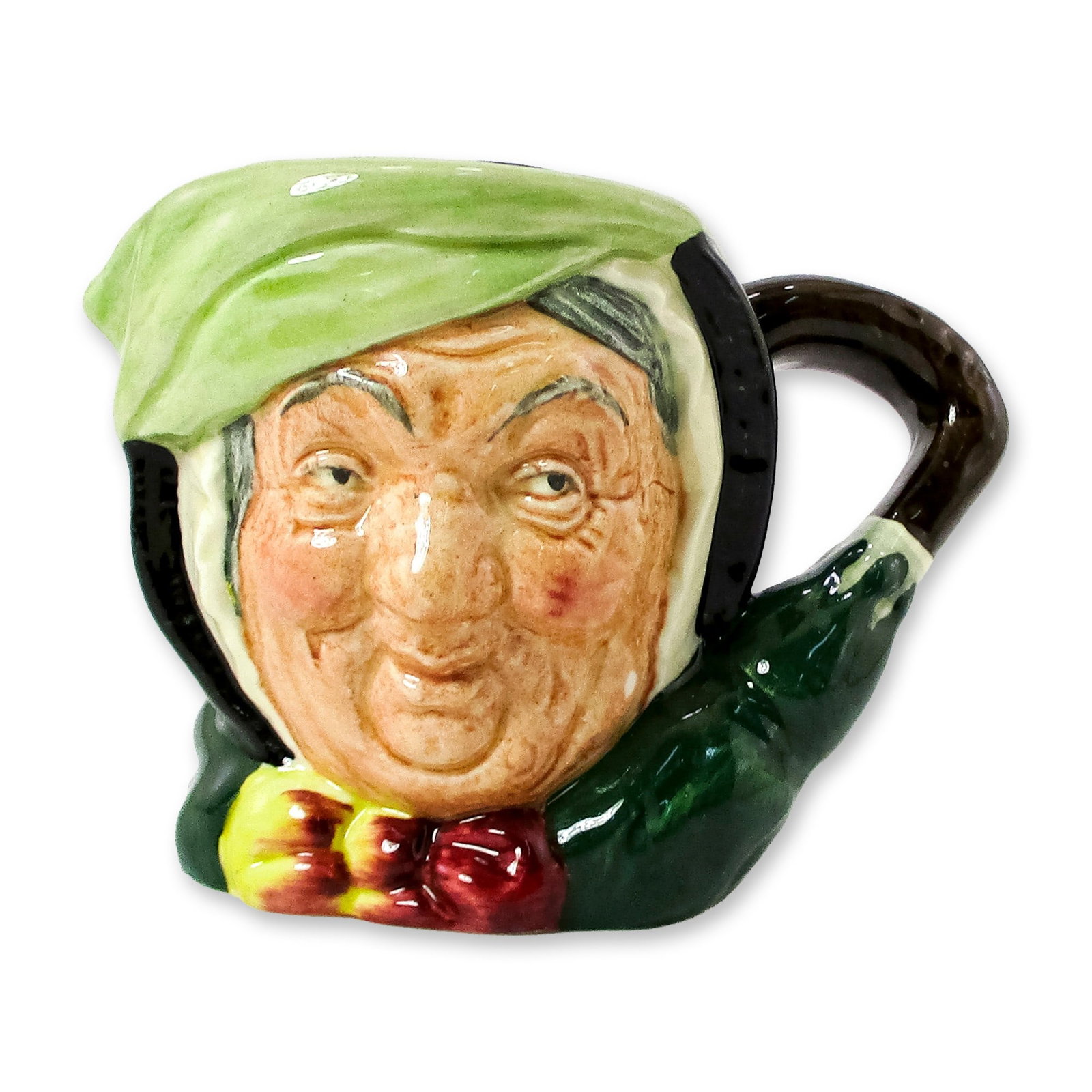 Sairey Gamp D5528 - Small - Royal Doulton Character Jug: Black hair; light green band; dark green coat; yellow and burgundy bow; green umbrella with brown handle. In Charles Dickens' 1843 novel, "Martin Chuzzlewit" Sairey Gamp is a gossiping, gin-drinking m