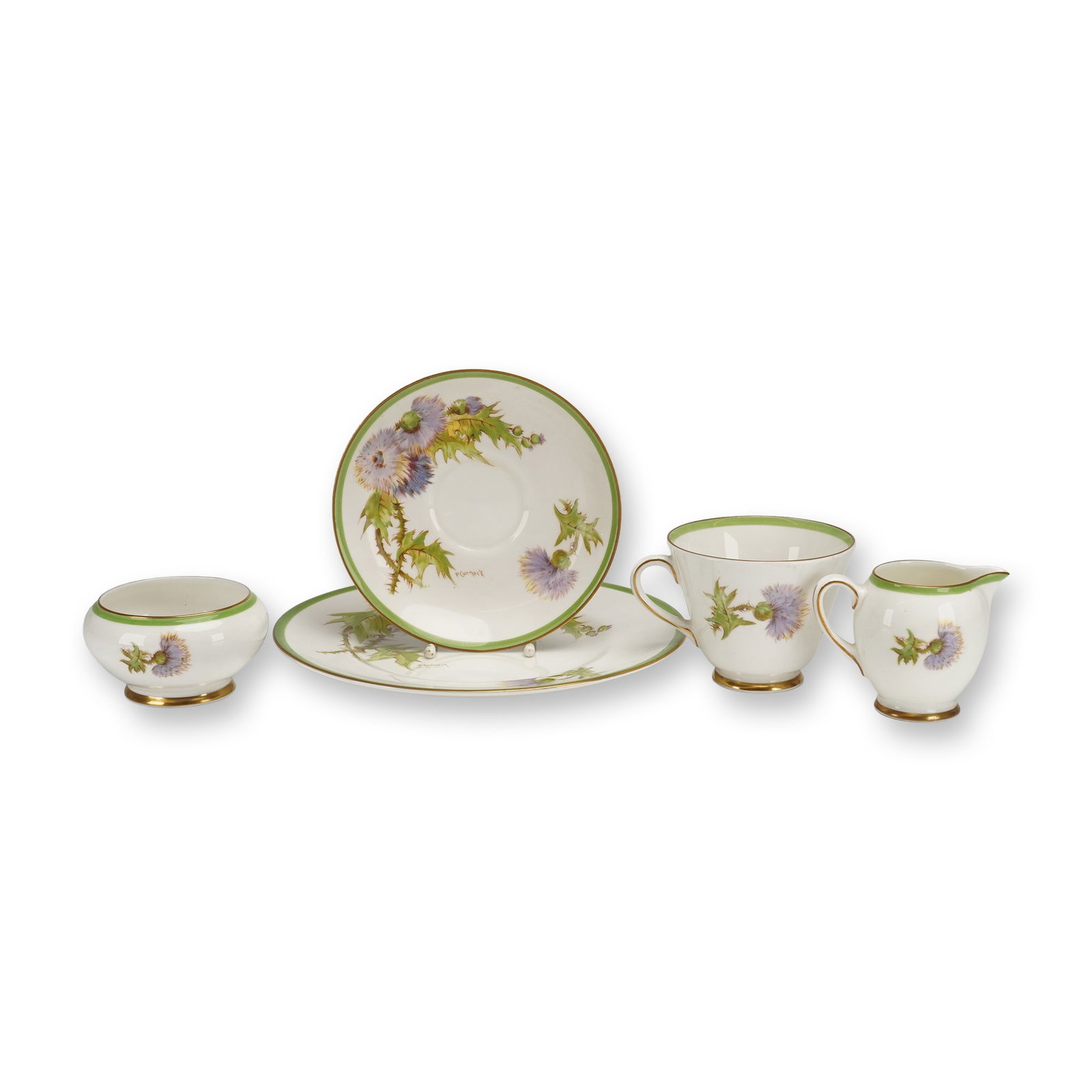 A 5-Piece Royal Doulton Glamis Thistle Porcelain Tea Service: A partial 5-piece tea service identified as Royal Doulton Glamis Thistle porcelain. The collection consists of one teacup, one saucer, one plate, one creamer, and one sugar bowl. The items are crafted