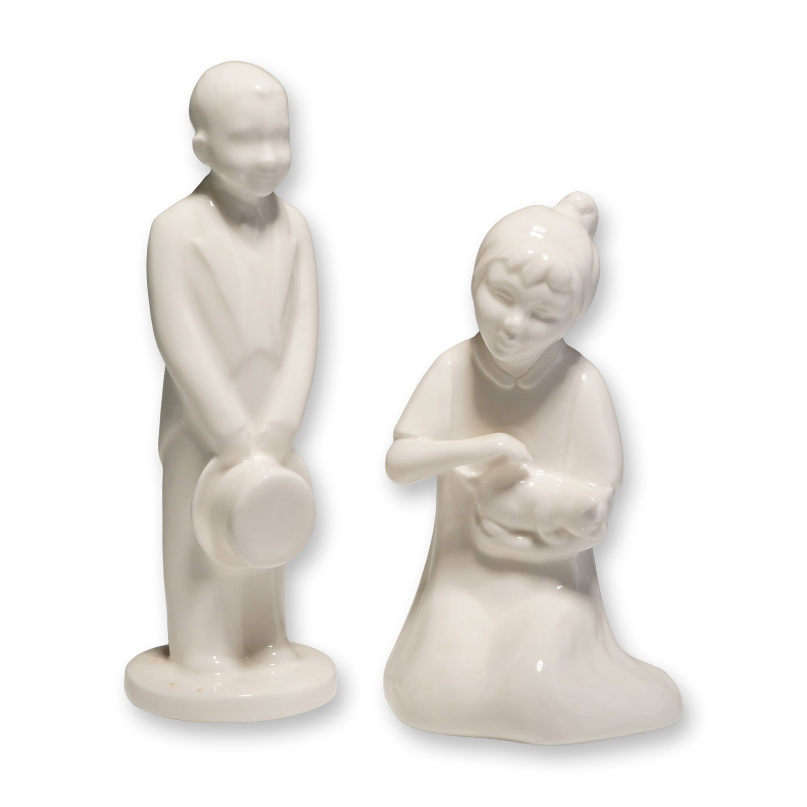 2pc Coalport Moments Bone China Figurines, The Pageboy and I Love You: A pair of monochromatic white glazed bone china figurines from the Moments by Coalport collection. The first figure is titled The Pageboy and depicts a standing male in formal attire holding a top hat