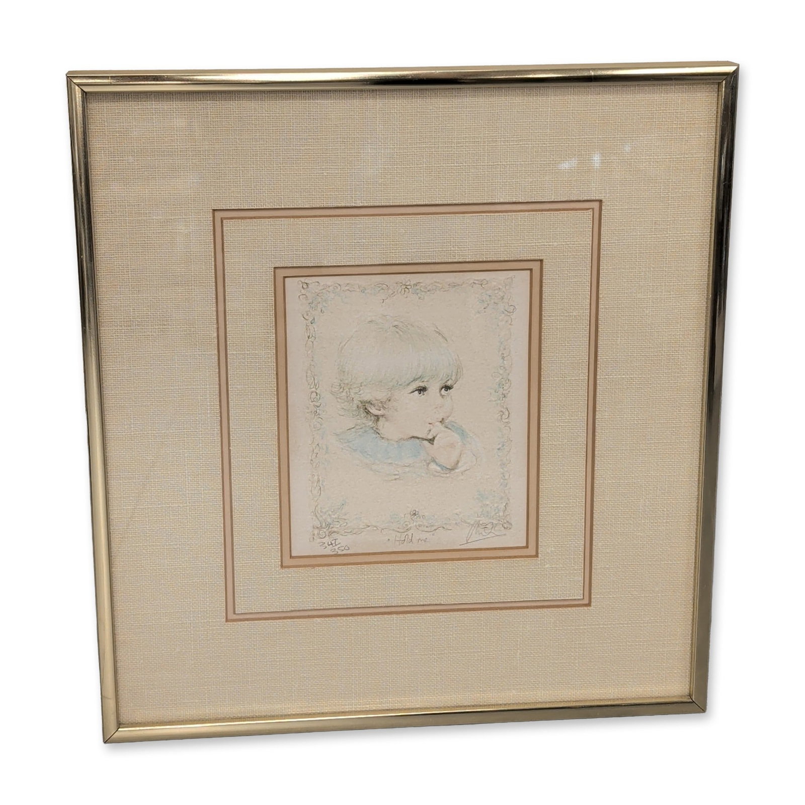 Mary Vickers, Hold me Limited Edition Lithograph: Limited edition color lithograph on textured paper. The work depicts a profile portrait of a child with large eyes sucking their thumb, set within a decorative light blue floral and scrollwork border.