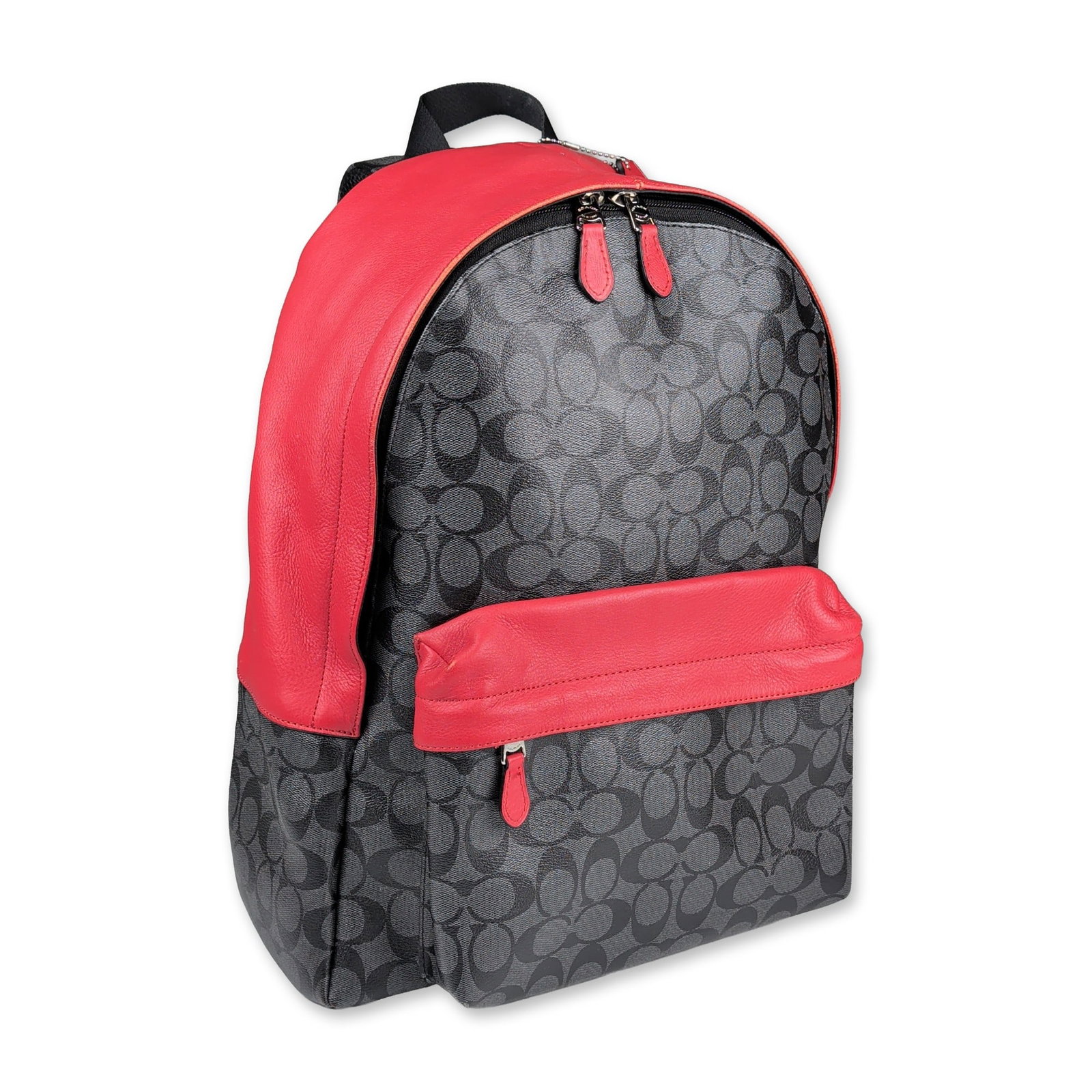 Coach Signature Canvas and Red Leather Campus Backpack: Coach Campus backpack in signature coated canvas and red pebbled leather. Features a dual-zippered main compartment, a front zippered pocket, a black nylon back panel, and padded adjustable shoulder s