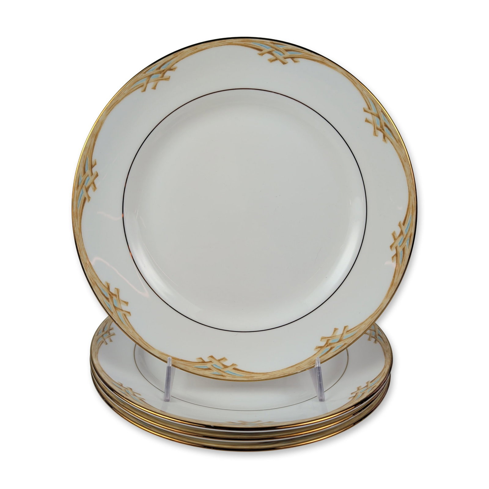 4pc Lenox British Colonial Bamboo Porcelain Dinner Plates: Lenox porcelain dinner plates in the Colonial Bamboo pattern from the British Colonial Collection, designed by Chuck Fischer. Each plate features a white ground with a wide flange decorated with a wov