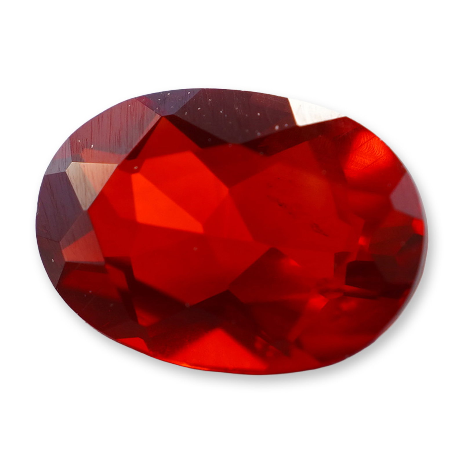 Faceted Oval Cut Red Labradorite Gemstone: An oval faceted labradorite gemstone displaying a saturated, deep red hue and is cut with a large table facet and geometric crown and pavilion facets. Weight: 0.5 ct. Dimensions: 5mm x 7mm