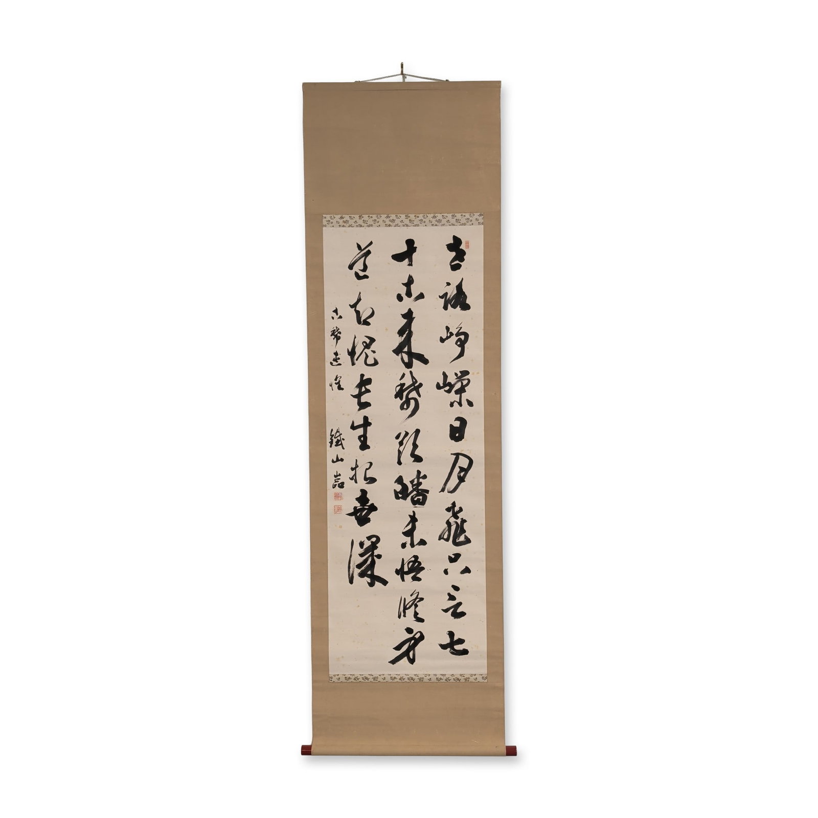 Large Chinese Ink on Paper Cursive Calligraphy Hanging Scroll w/ Seal: Chinese hanging scroll featuring ink calligraphy in cursive script on paper. The work is mounted on a tan paper backing with decorative floral-patterned silk borders, finished with dark red-toned red
