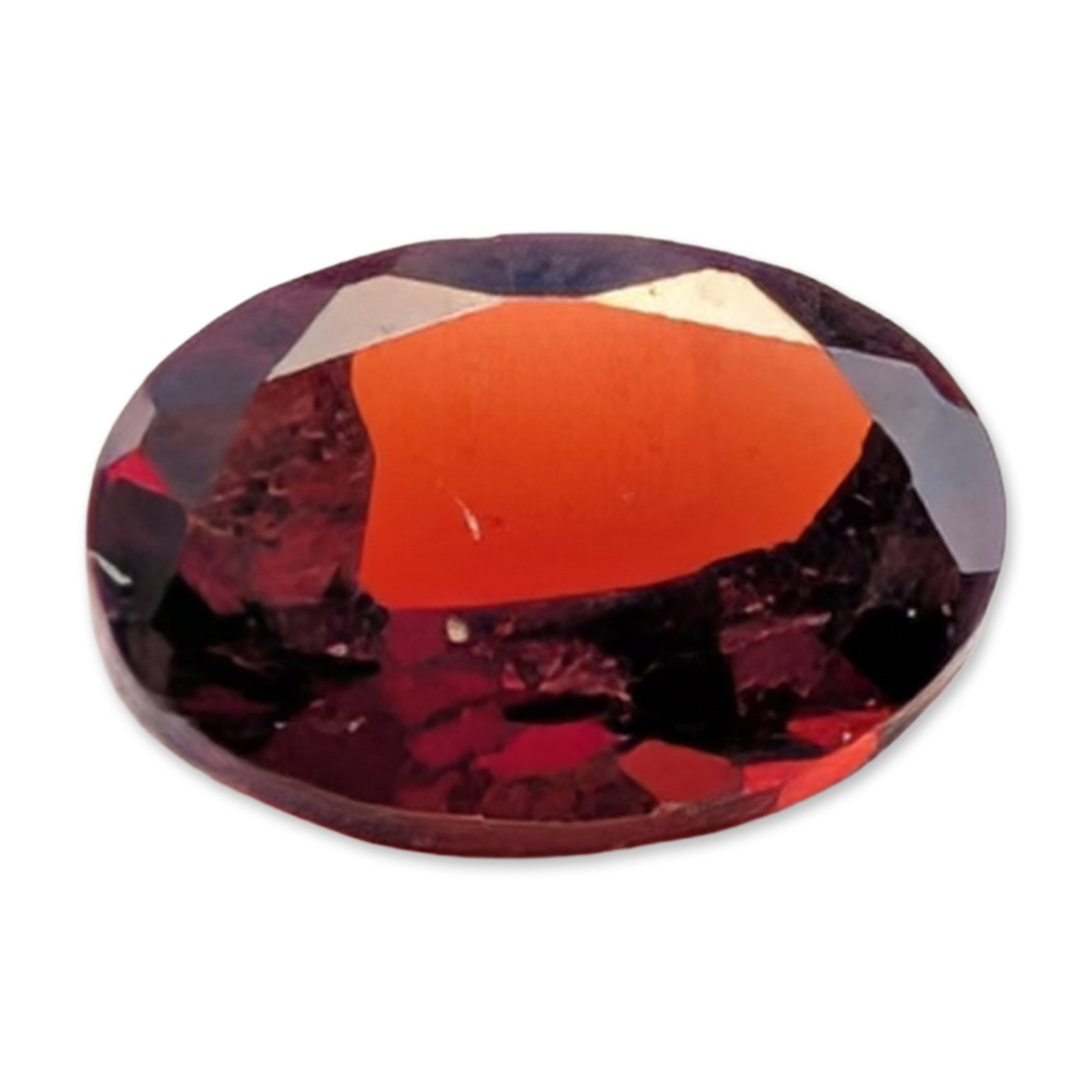 Oval Faceted Natural Red Garnet Gemstone: A loose faceted gemstone appearing to be a natural red garnet. The stone features a deep saturated brownish-red color and is presented in an oval faceted cut. Visual characteristics are consistent wit