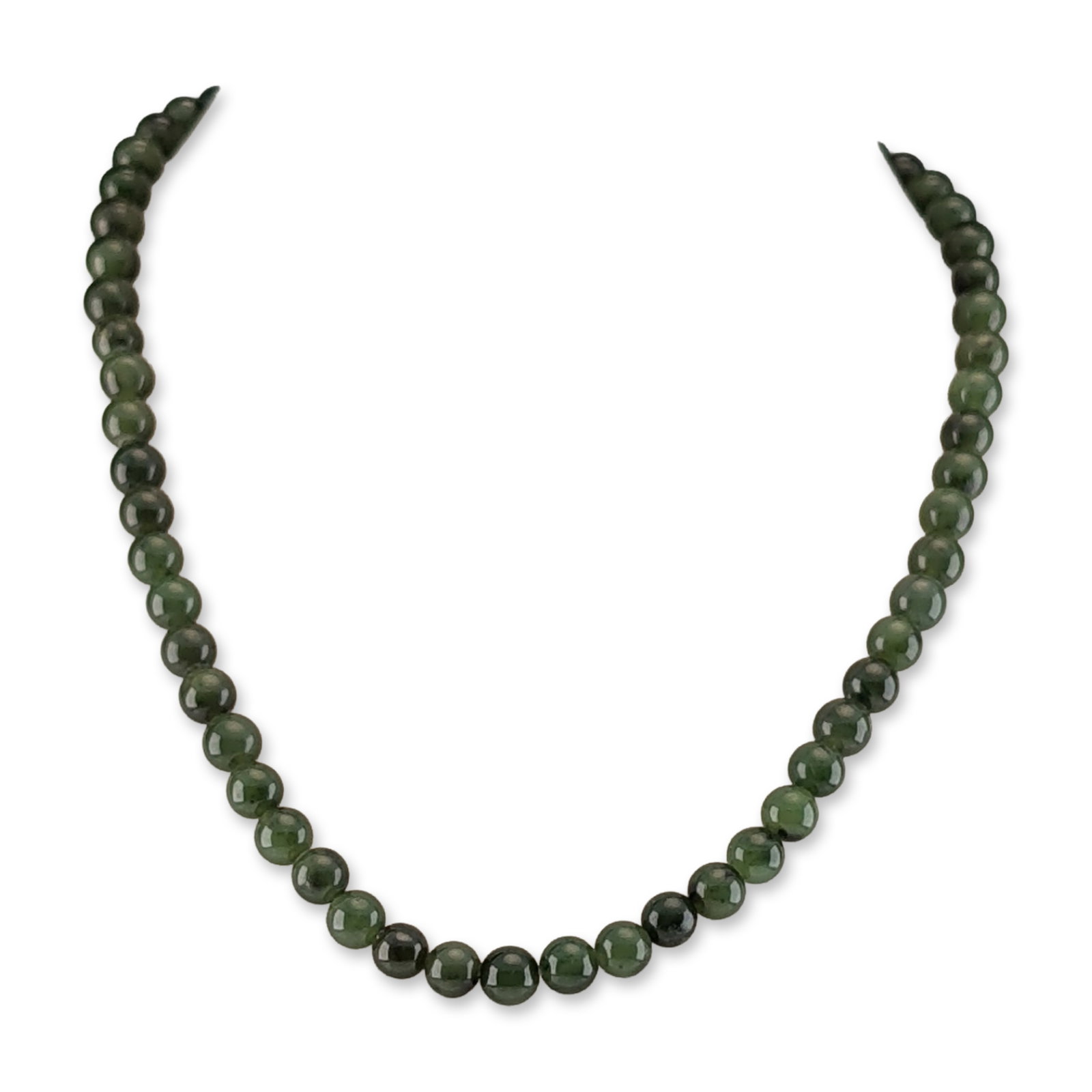 Vintage Sterling Silver and Green Jade Beaded Necklace: A vintage single-strand beaded necklace composed of polished round green jade beads. The beads exhibit a range of mossy to forest green tones with characteristic natural dark inclusions throughout. Th