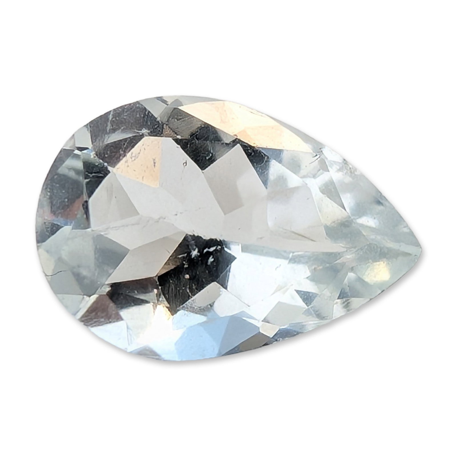 Pear Cut Pale Blue Aquamarine Gemstone: A loose faceted gemstone that appears to be a light blue aquamarine. The stone is cut in a pear shape with a faceted crown and pavilion. It exhibits a very pale, watery blue to near-colorless hue.