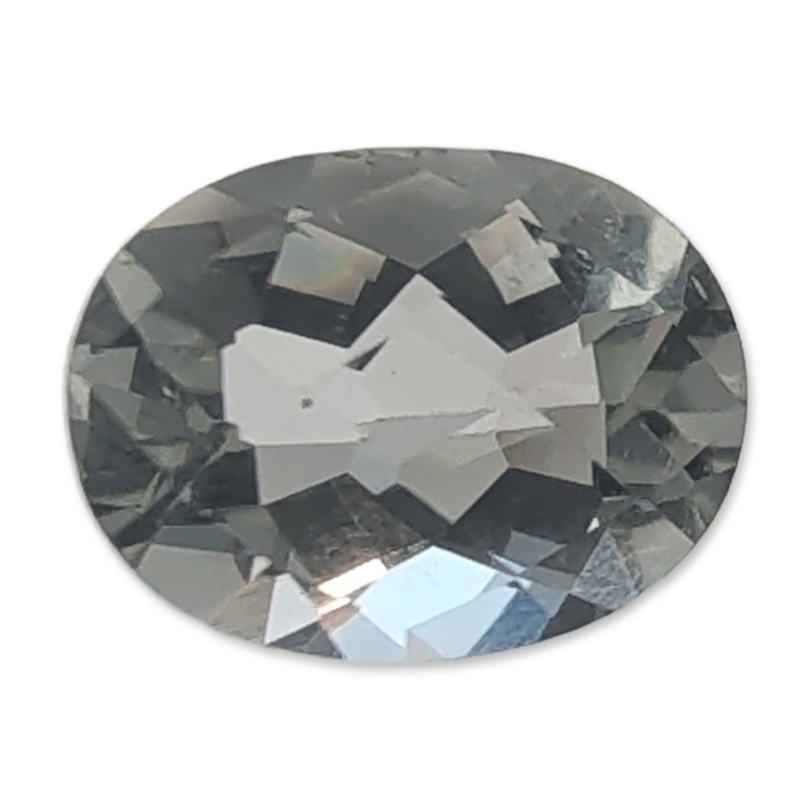 Oval Brilliant Cut Aquamarine Loose Gemstone: Loose faceted gemstone featuring an oval brilliant cut and a pale, cool-toned green to silvery-gray color. The stone is a pale aquamarine. The gem exhibits eye-clean clarity and well-defined facets