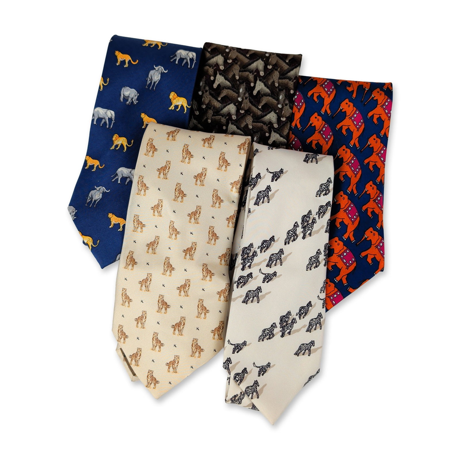5pc Wathne, Krizia Uomo & Safari Motif Neckties: A collection of men's neckties in silk and polyester fabrics, featuring animal and safari-themed patterns. Designs include zebras, Krizia Uomo tigers with black birds, an Into Africa savannah scene wi