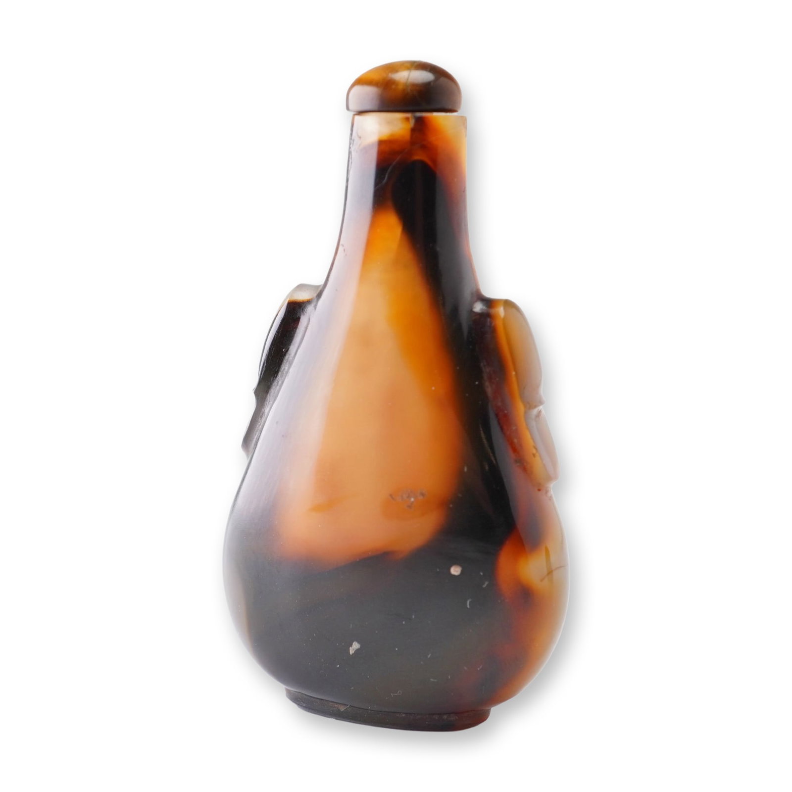 Tan, Brown, and Black Agate Snuff Bottle, Pear Form, Faux Handles: A pear-form agate snuff bottle with a matching stopper, featuring hues of tan, brown, and black, and molded handles. Dimensions: 1.5"L x 0.25"W x 2.5"H Weight: 1.5 oz