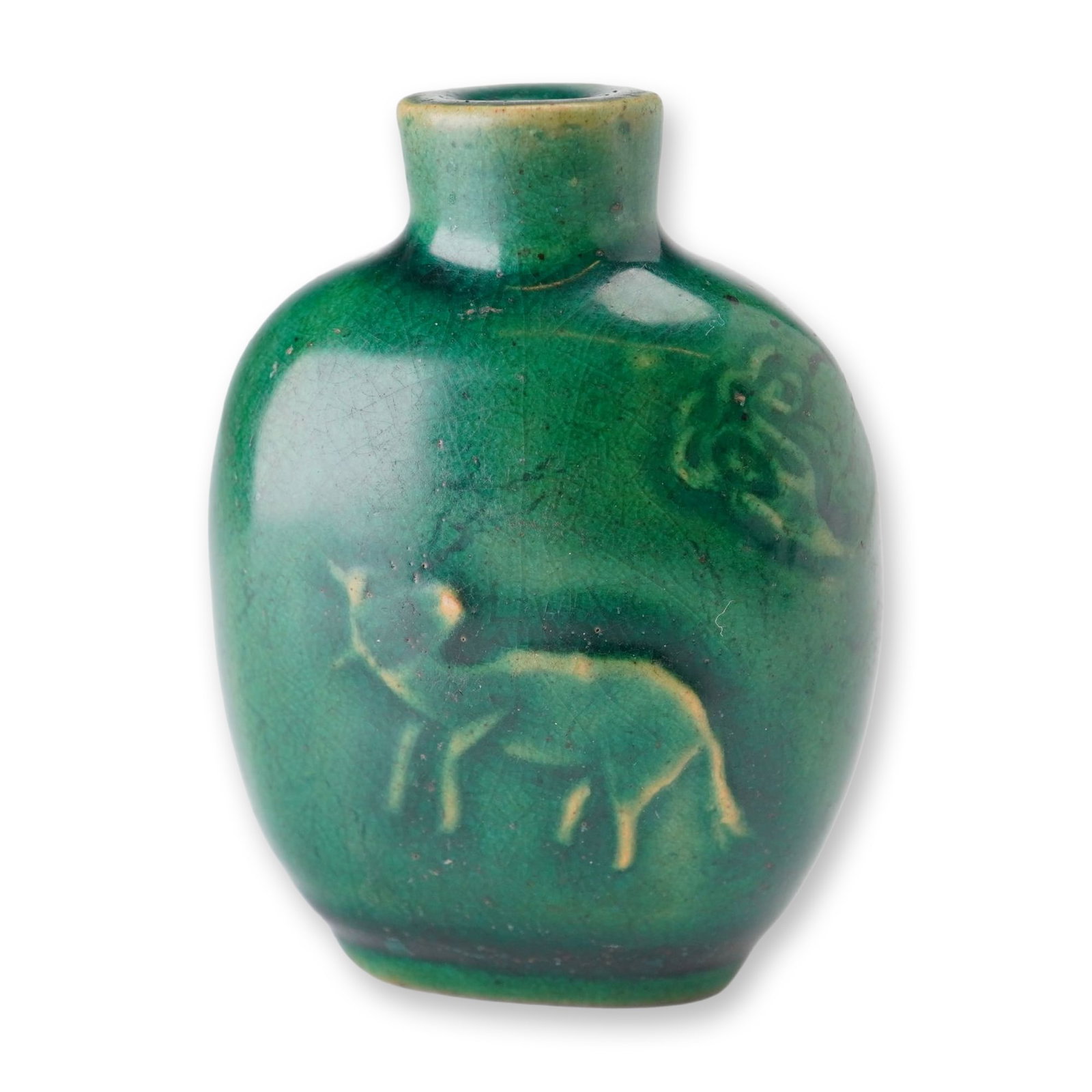 Green Glazed Porcelain Snuff Bottle, Low Relief Animals: A porcelain snuff bottle featuring an emerald-green glaze, decorated with low-relief depictions of animals. Dimensions: 1.75"L x 1"W x 2.5"H Weight: 1.8 oz