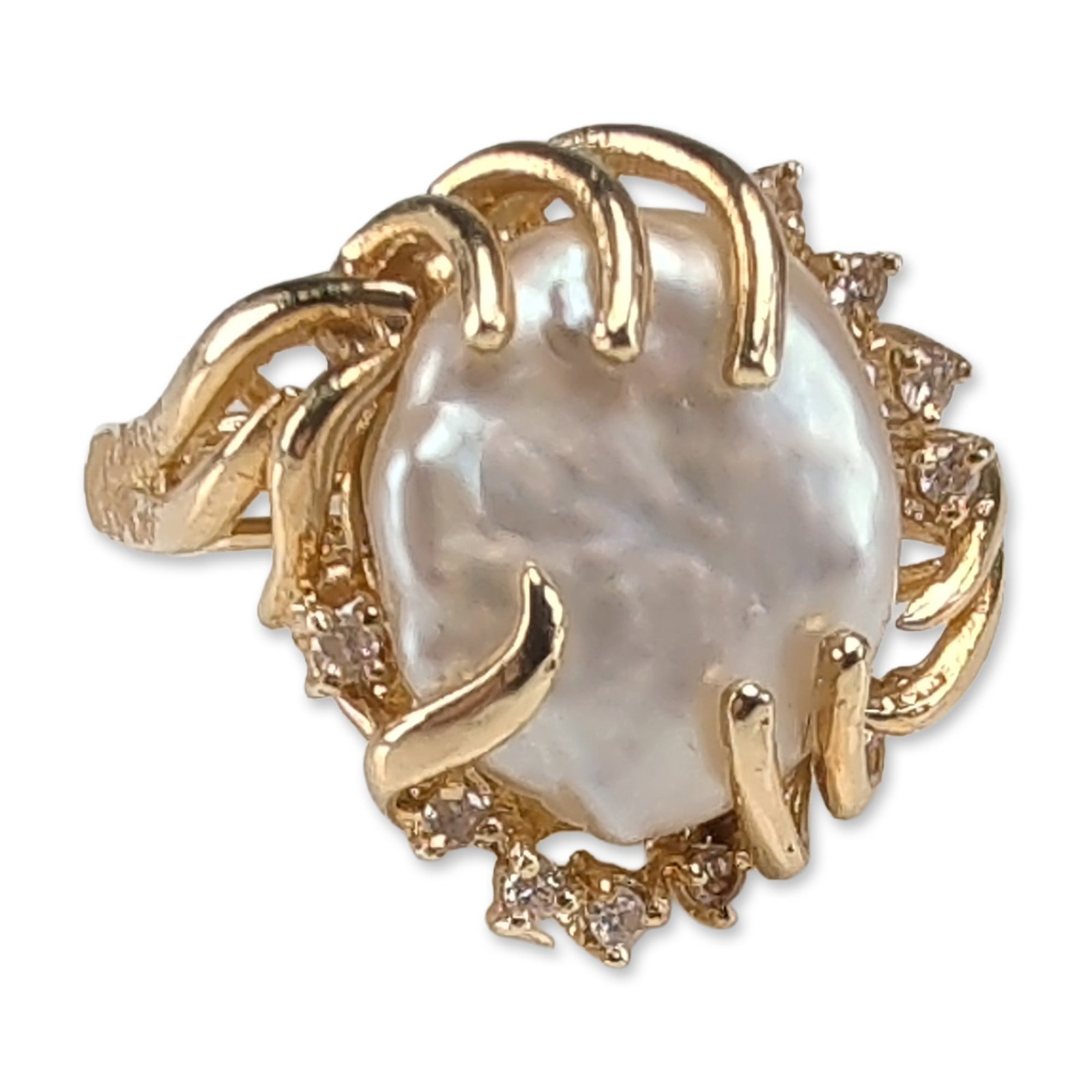 14K Yellow Gold White Button Freshwater Pearl and Diamond Cocktail Ring: A 14 karat yellow gold cocktail ring. The piece features a central large freshwater pearl with high luster, secured by stylized, organic curved prongs that wrap around the irregular surface of the