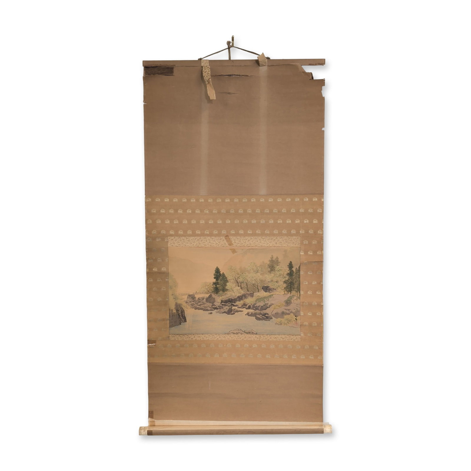 Japanese Hanging Scroll Ink and Color Pigments on Silk, Landscape, Signed w/ Seal: Japanese hanging scroll of a landscape rendered in ink and light color pigments on paper, featuring a riverbank with rock formations, a wooden fence, and pine trees against a soft mountain background.
