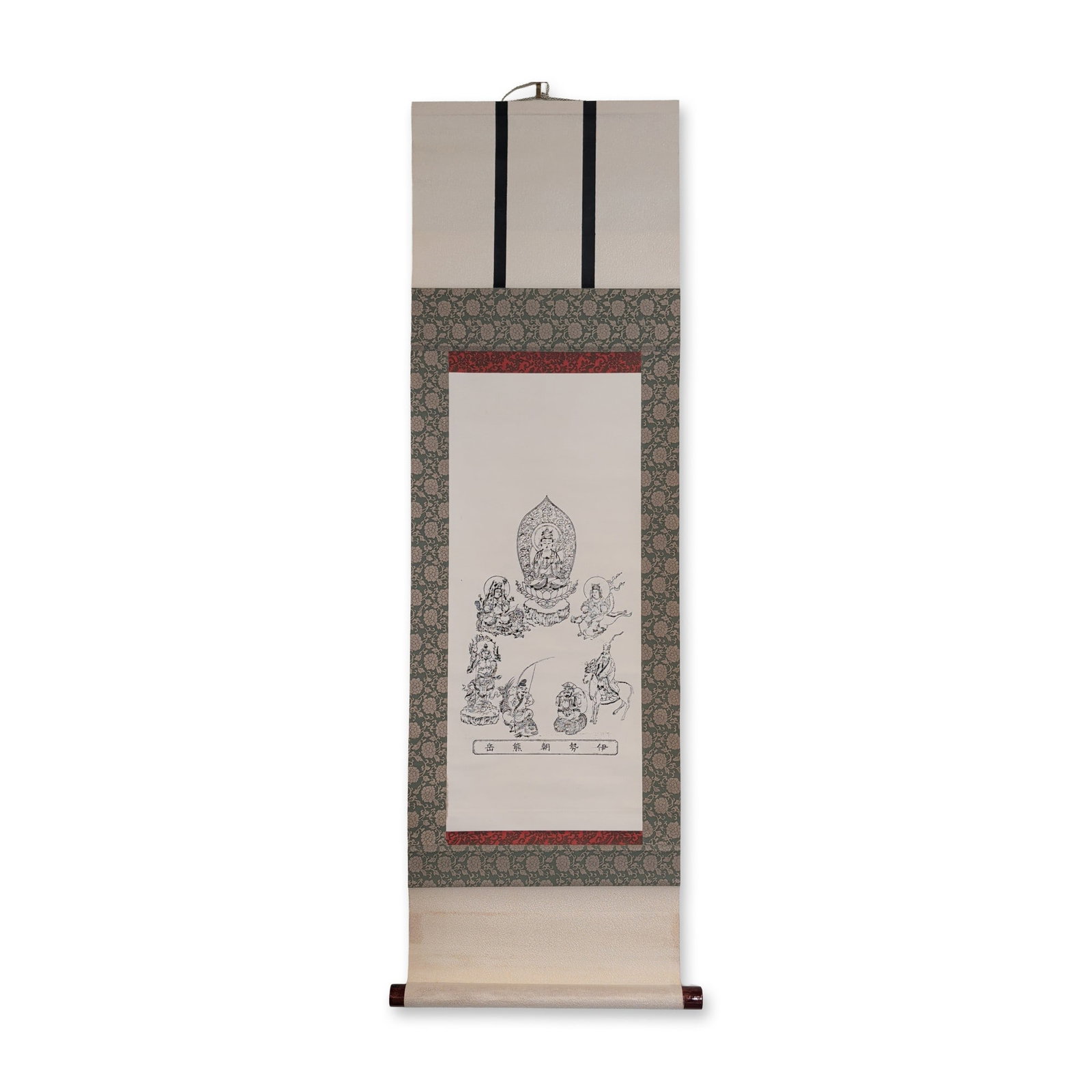 Japanese Seven Lucky Gods Buddhist Woodcut on Paper Hanging Scroll: A Japanese hanging scroll featuring a woodcut on paper of the Seven Lucky Gods surrounding a central Buddhist deity. The Seven Lucky Gods are depicted with traditional attributes, including Ebisu with