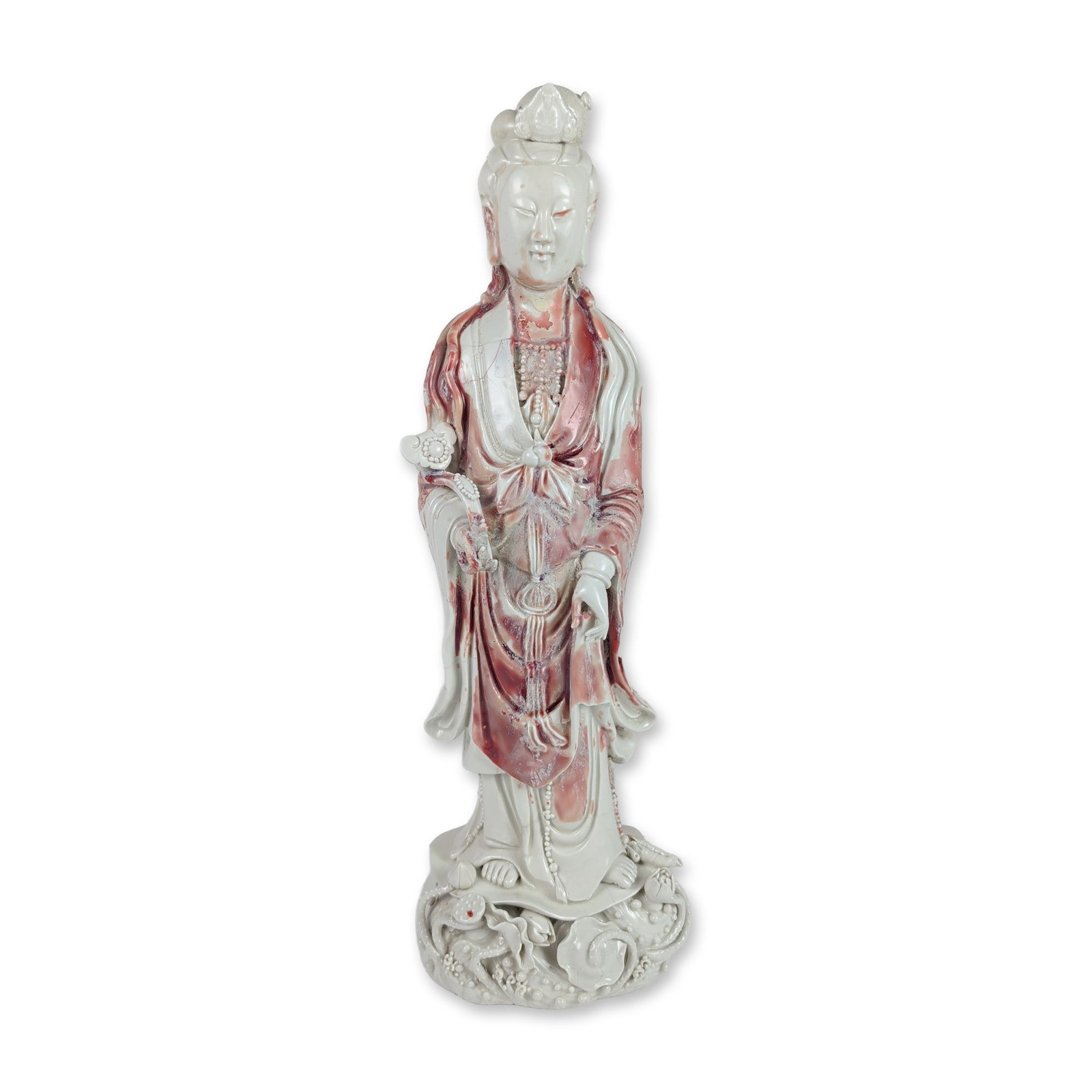 Chinese Distressed-Glaze Porcelain Guanyin Sculpture: This decorative export porcelain sculpture depicts a standing figure of Guanyin modeled in the traditional Dehua style, a historically celebrated Chinese ceramic method famous for its heavy vitrified