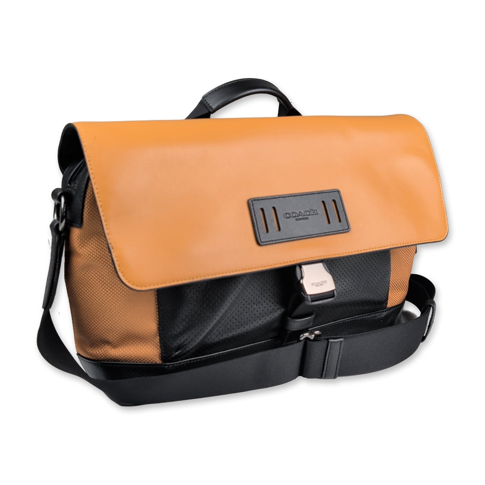 Coach Terrain Mixed Material Messenger Bag: Coach Terrain messenger bag, model F77034, featuring a multi-material construction including a tan leather top flap, brown woven nylon body, and black leather base. The design includes a front storage