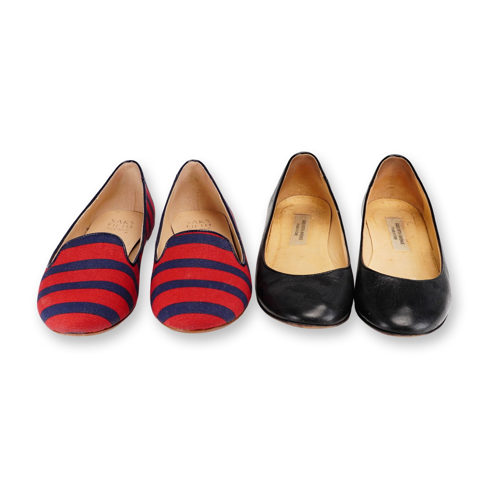 Two Pairs of Saks Fifth Avenue Loafers: Collection of two pairs of Saks Fifth Avenue slip-on loafers. One pair is crafted in red textile with navy horizontal stripes, featuring a rounded toe and low-profile silhouette; underside marked "SAK