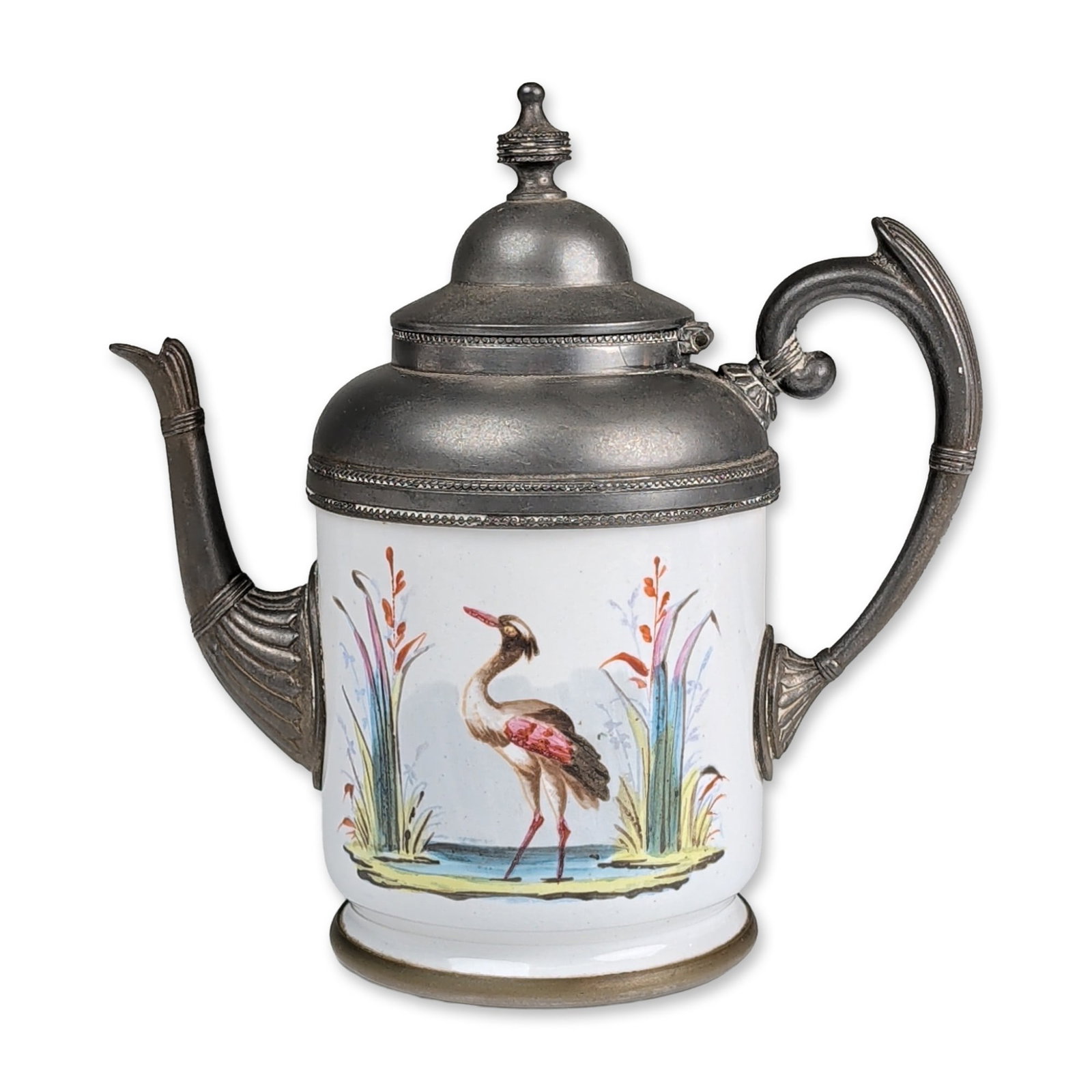 Hand Painted Enamel and Metal Miniature Pot: The piece features a cylindrical glazed ceramic body decorated with a hand-painted enamel scene depicting a heron or crane standing in a marsh landscape with reeds and water plants in shades of blue,