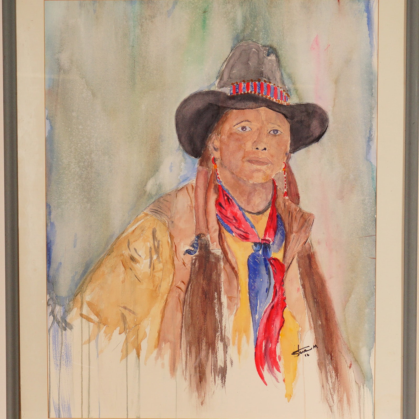 Steve M., Watercolor on Paper Painting, Portrait Western Woman, Signed: Original watercolor on paper painting depicting a Western woman wearing a brown hat adorned with red and blue beadwork, a tan jacket, and a vibrant red and blue neck scarf. The subject's steady gaze a