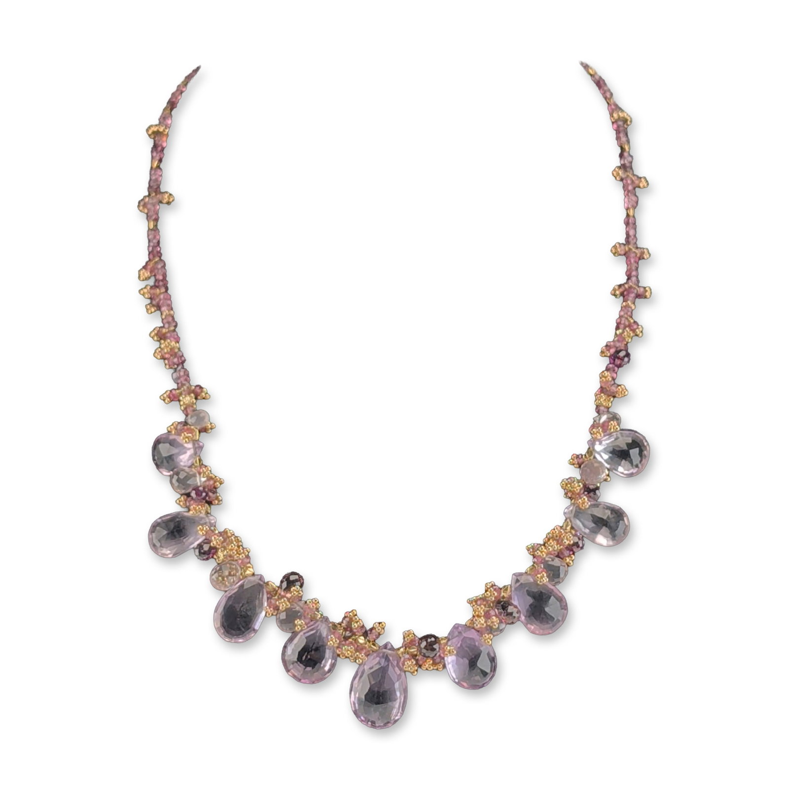 Amethyst Multi-shape 18K Yellow Gold Fringe Necklace: Contemporary 18k yellow gold fringe necklace featuring a graduated arrangement of amethysts and lilac-pink gemstone pear-shaped briolettes. The central fringe consists of stones suspended from an